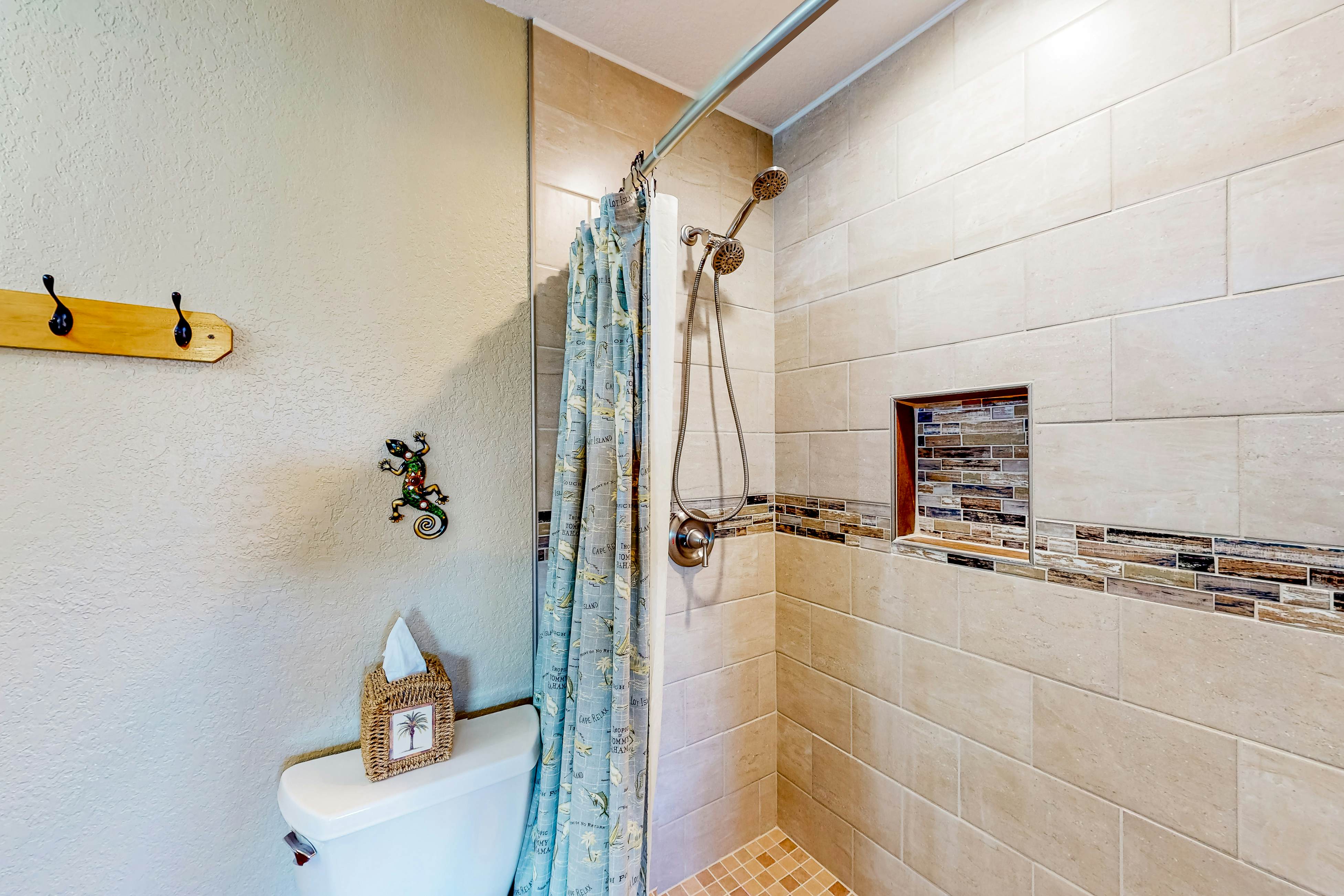 Beachfront condo with balconies, grill, AC, & pool access - steps from the sand