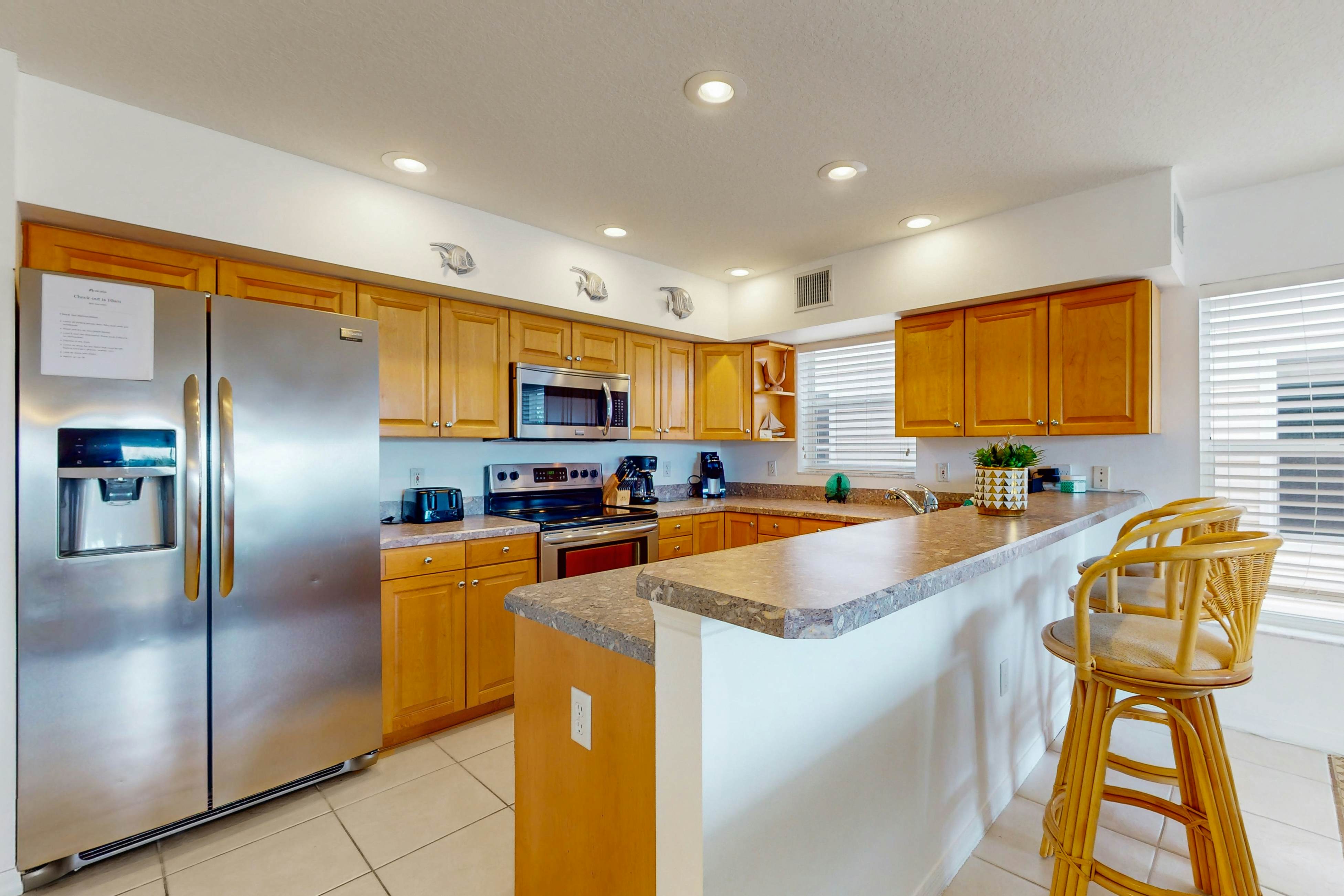 Snowbird friendly condo w Intracoastal and pool views heated pool dock and AC