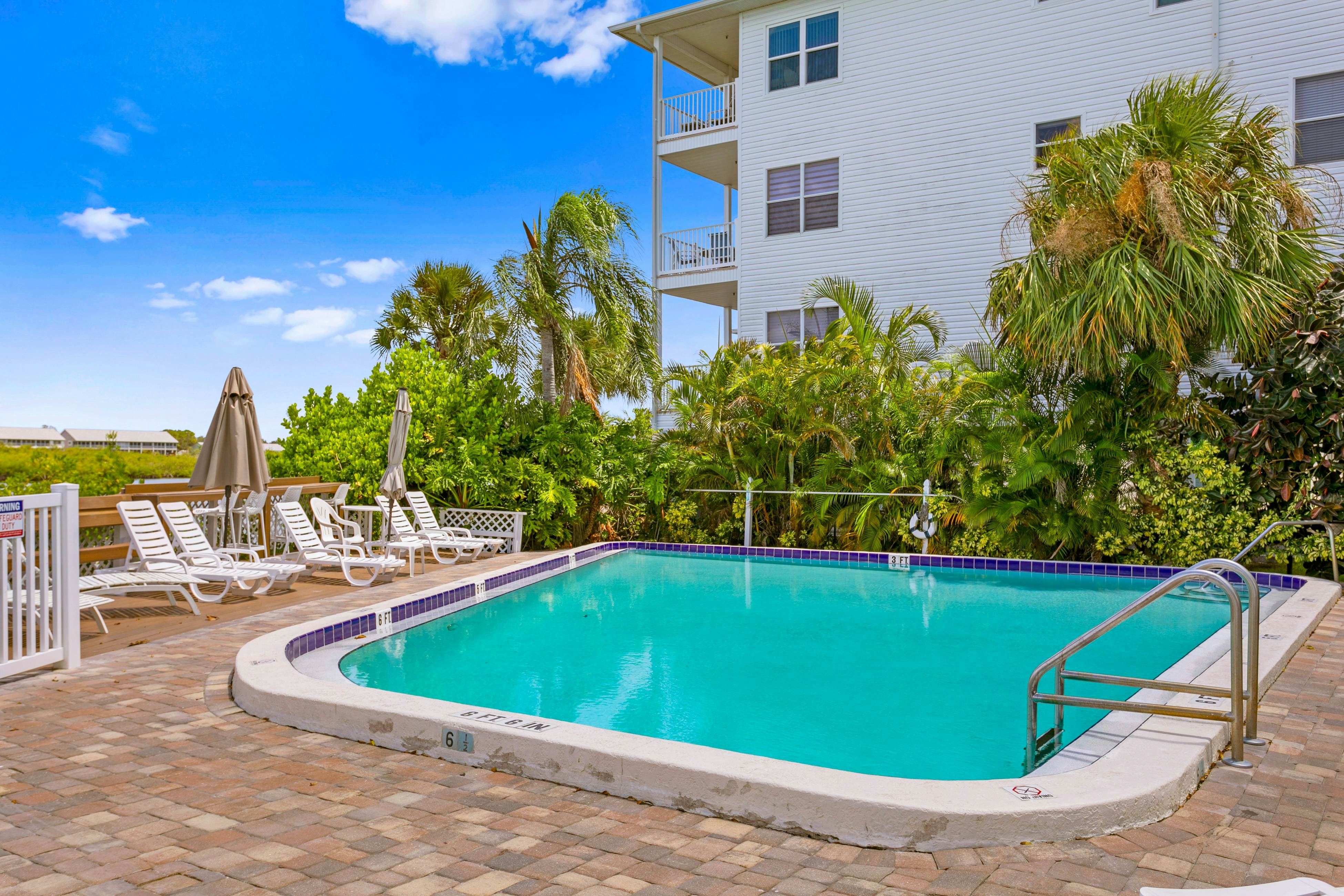 Renovated condo with on-site pool, beach access & modern charm