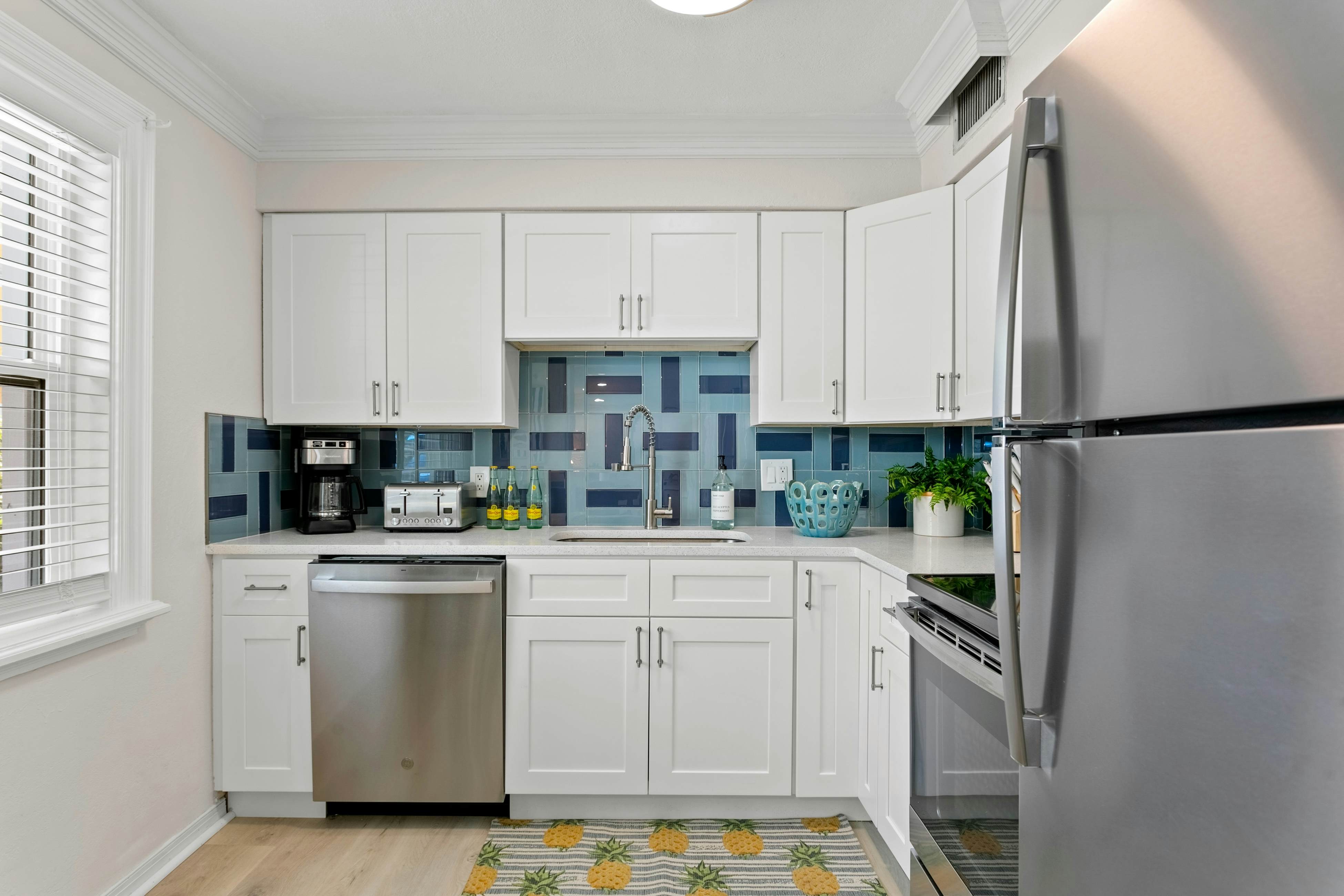 Renovated condo with on-site pool, beach access & modern charm