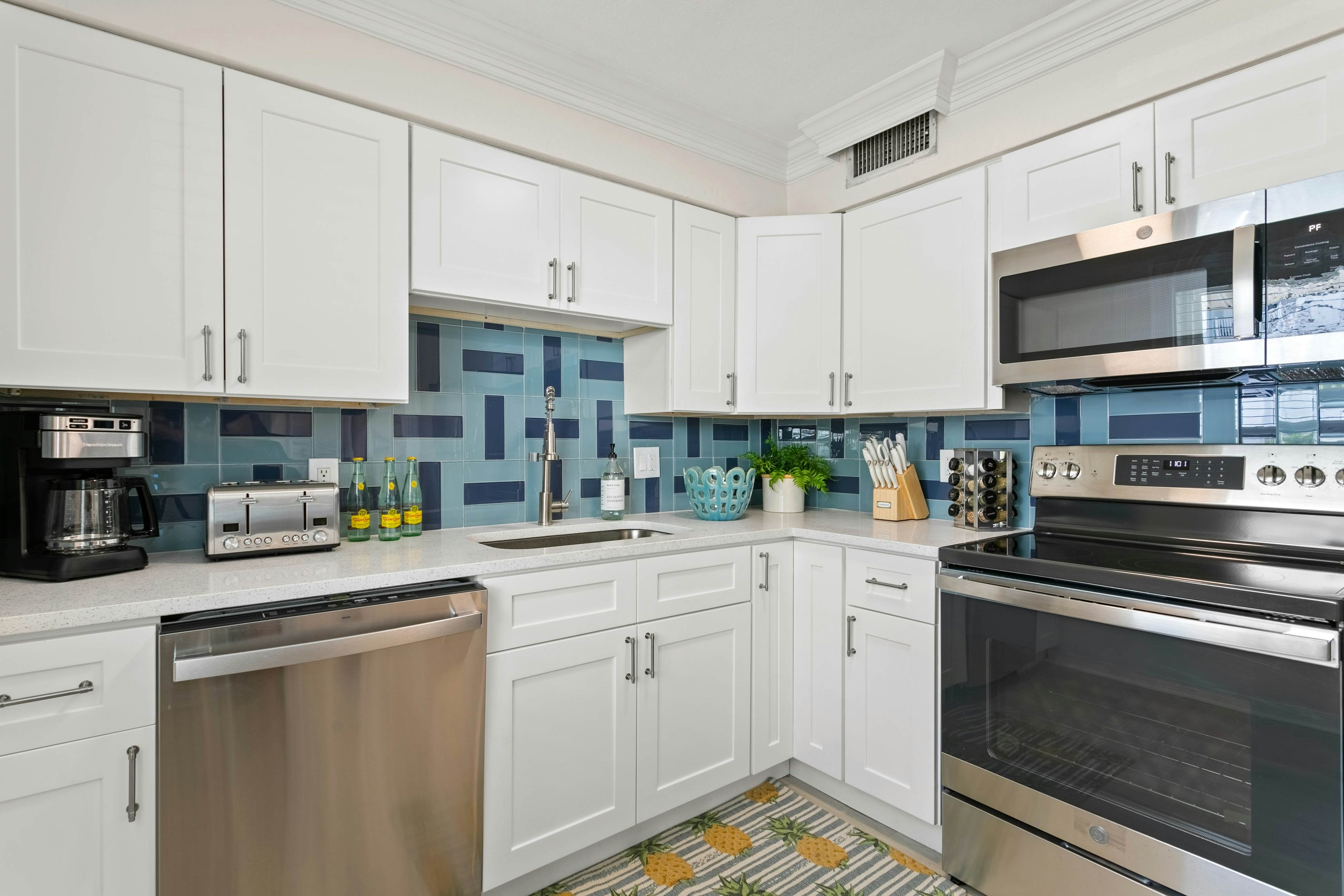 Renovated condo with on-site pool, beach access & modern charm