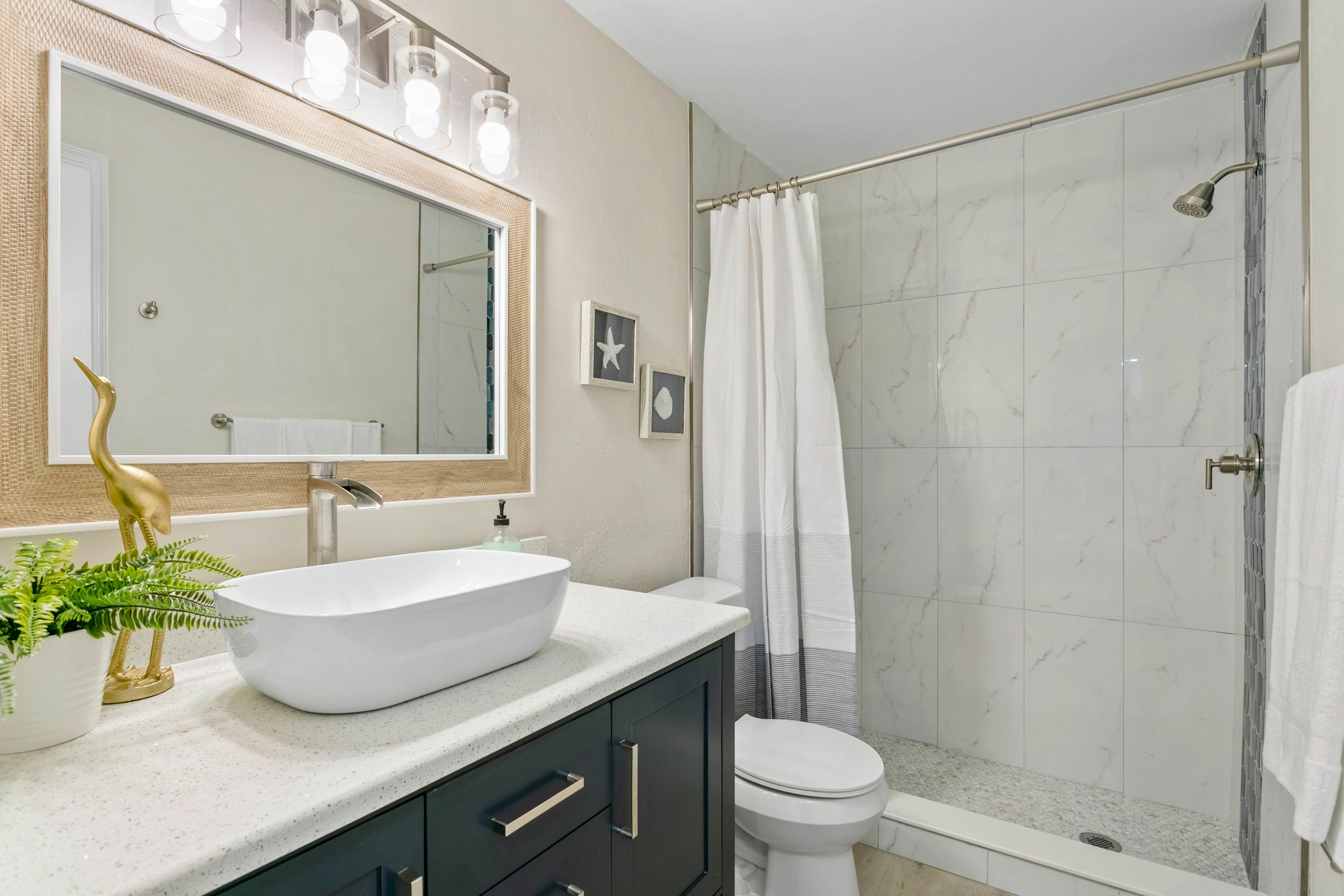 Renovated condo with on-site pool, beach access & modern charm