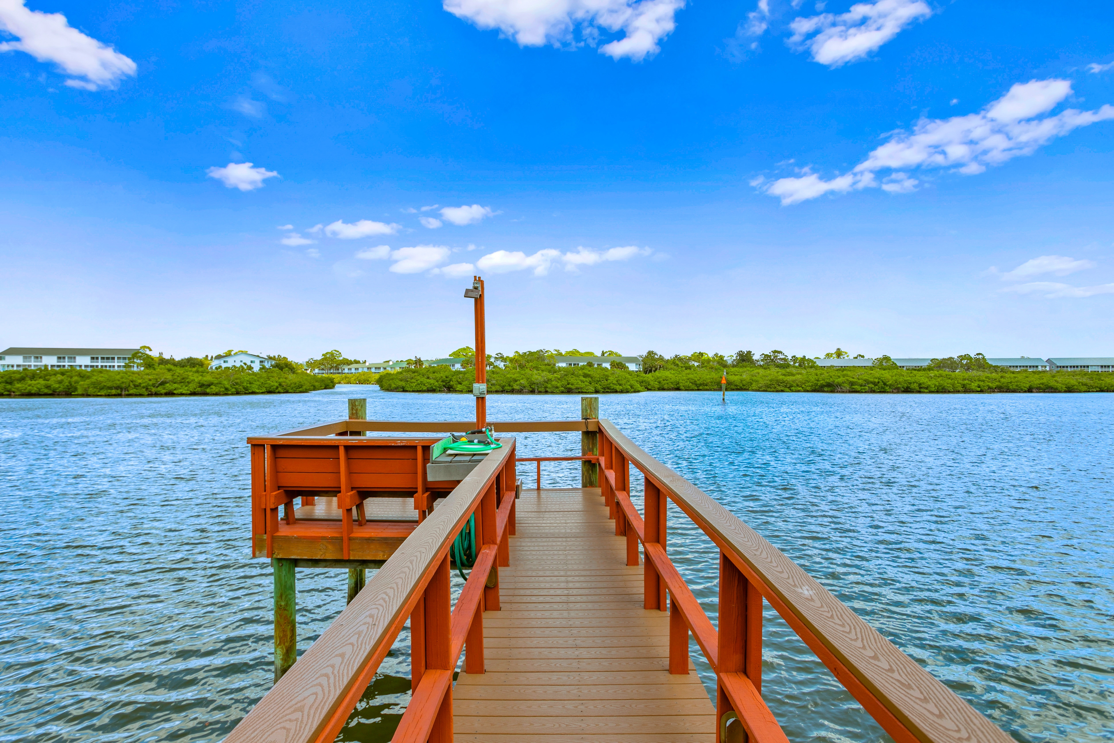 Renovated condo with on site pool beach access and modern charm