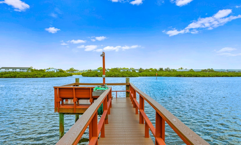 Renovated condo with on site pool beach access and modern charm