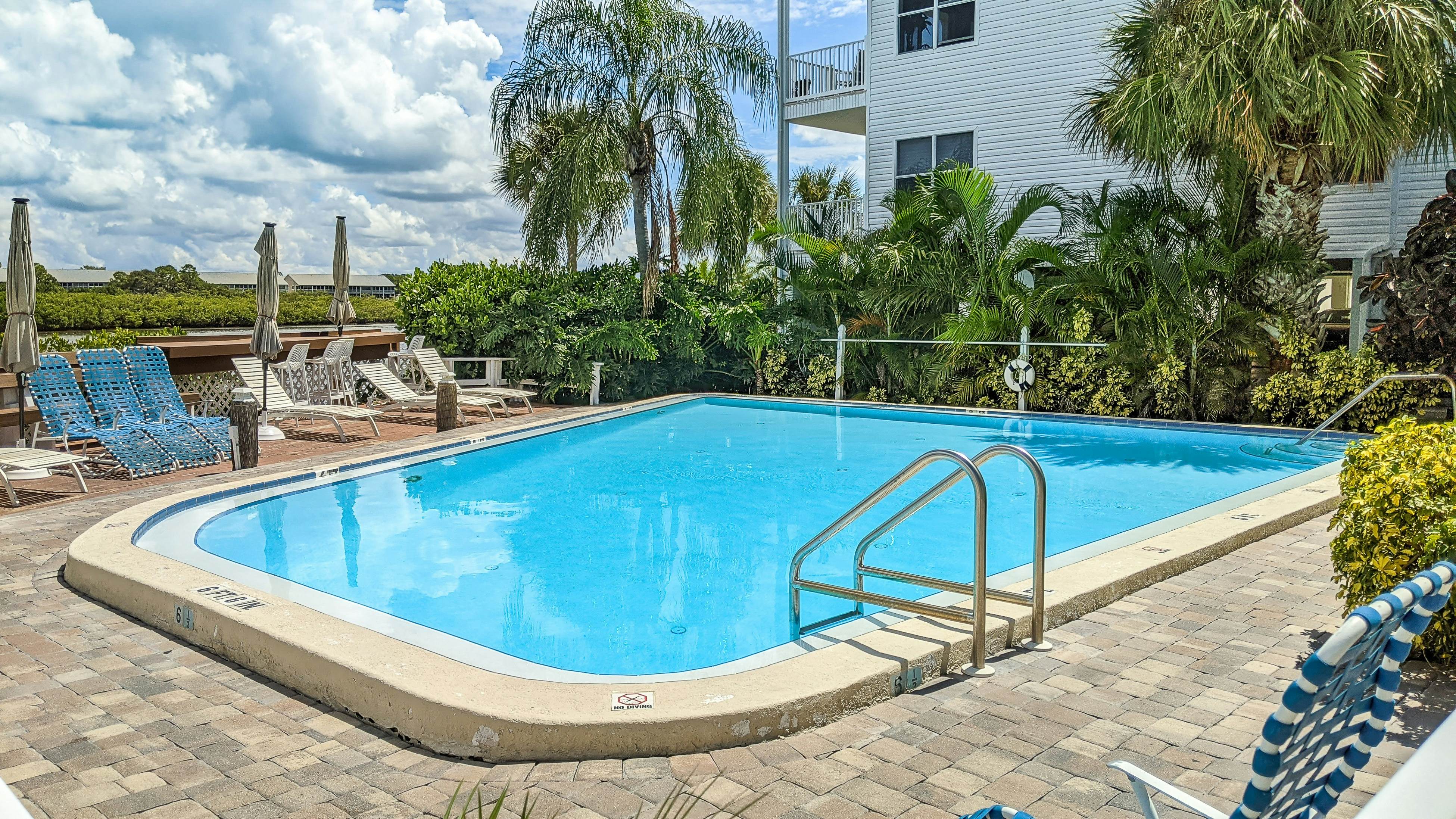 Renovated condo with on-site pool, beach access & modern charm