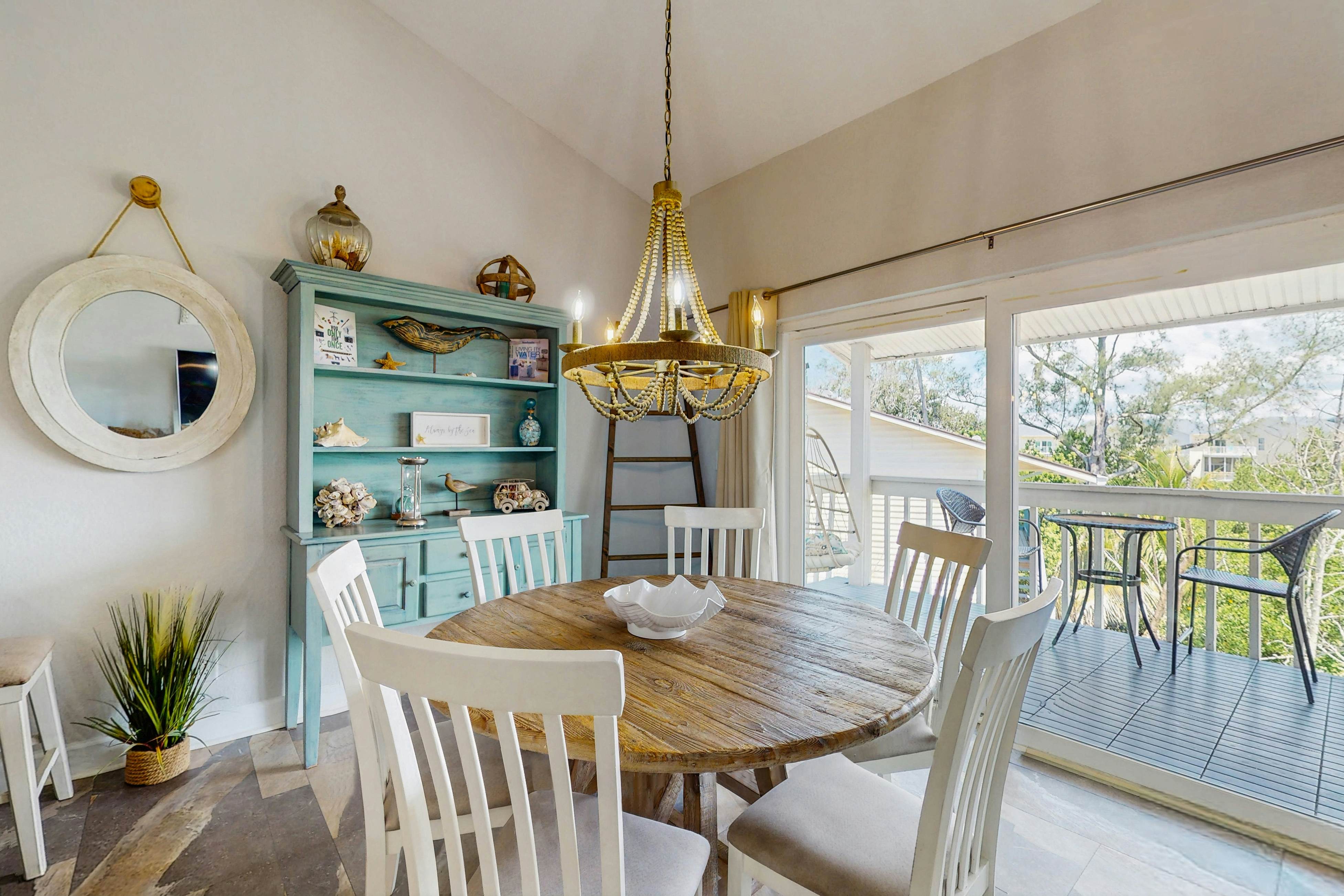 Tropical gem with pool - steps to beach - water-view balcony, private W/D & AC