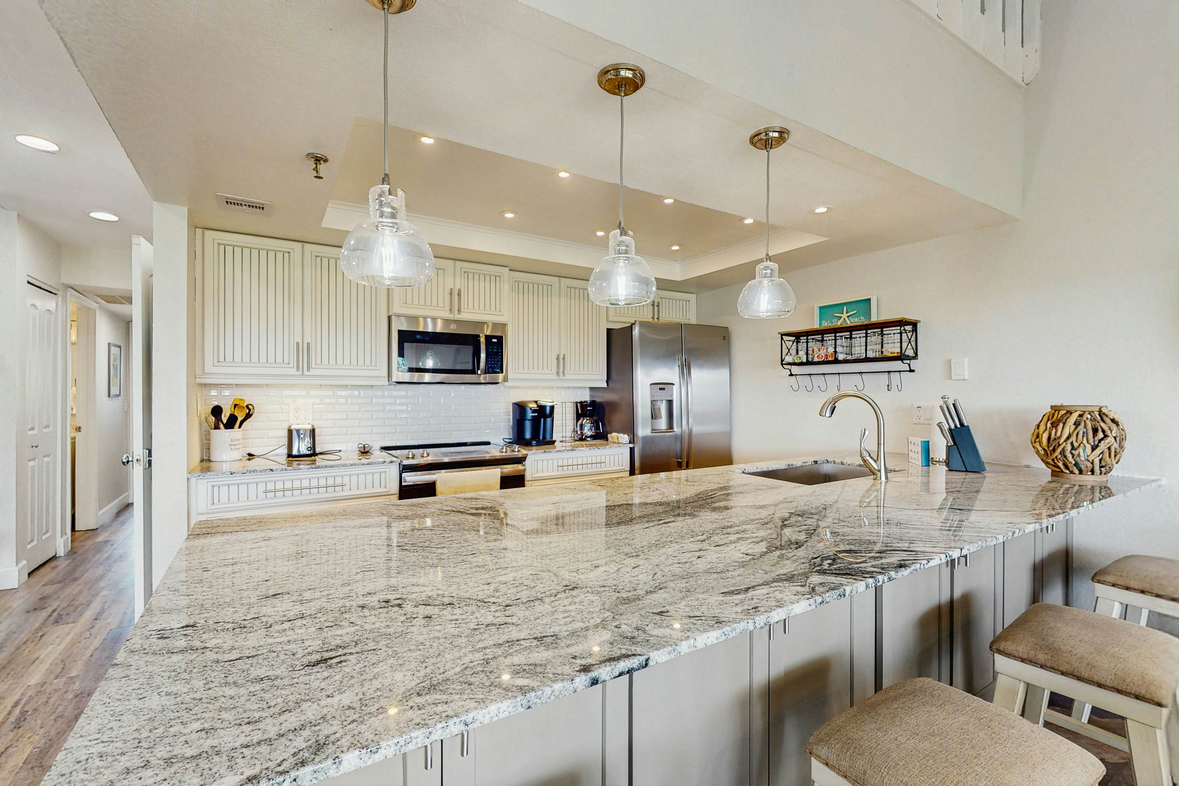 Tropical gem with pool - steps to beach - water-view balcony, private W/D & AC