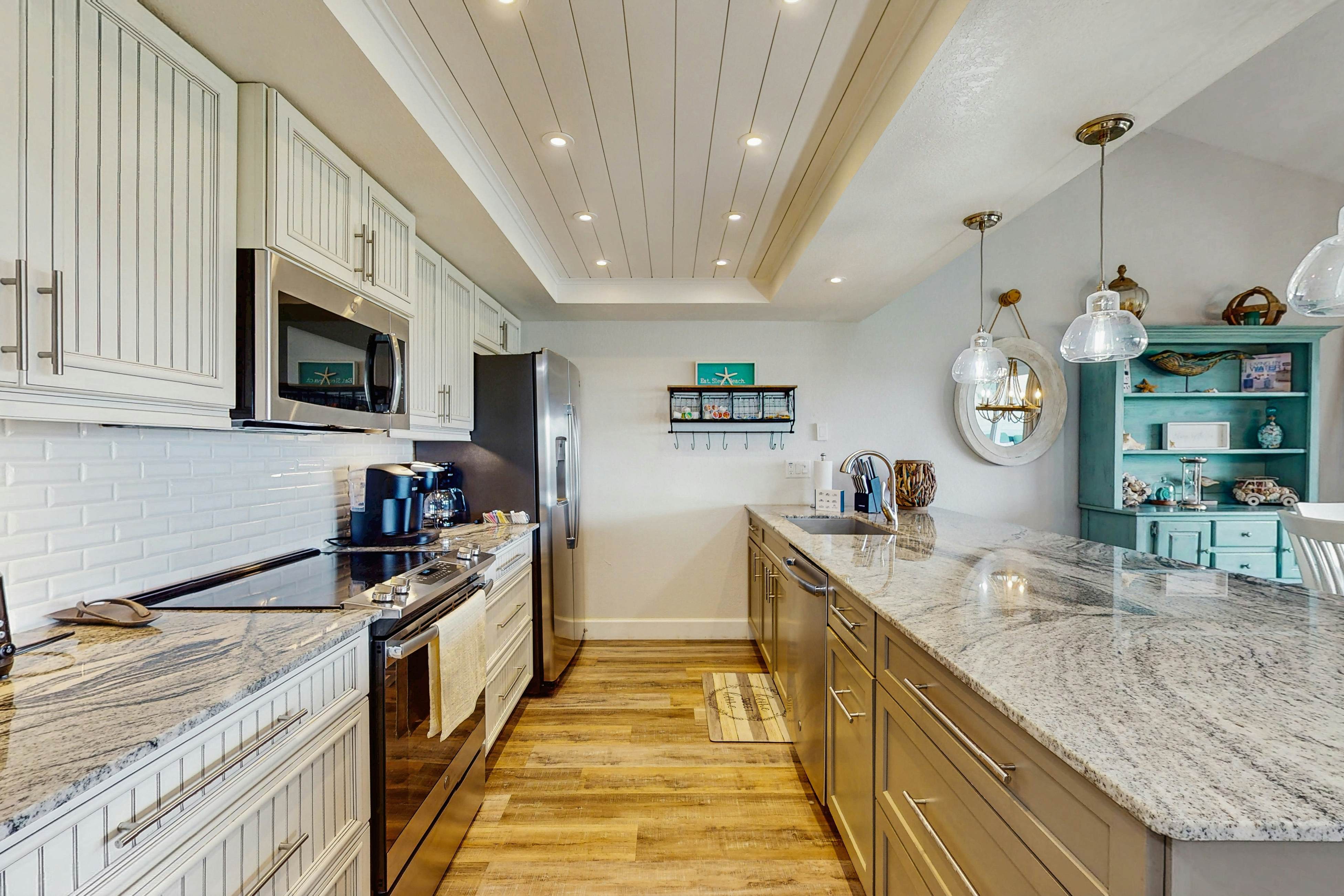 Tropical gem with pool - steps to beach - water-view balcony, private W/D & AC