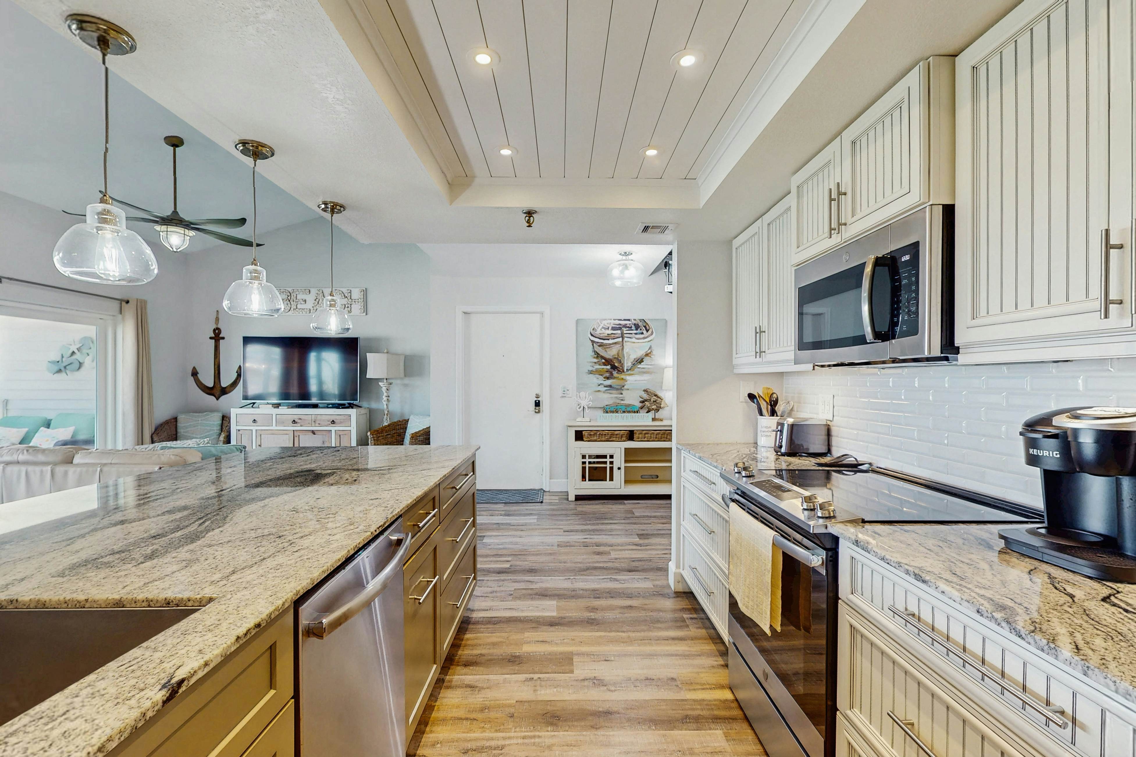 Tropical gem with pool - steps to beach - water-view balcony, private W/D & AC