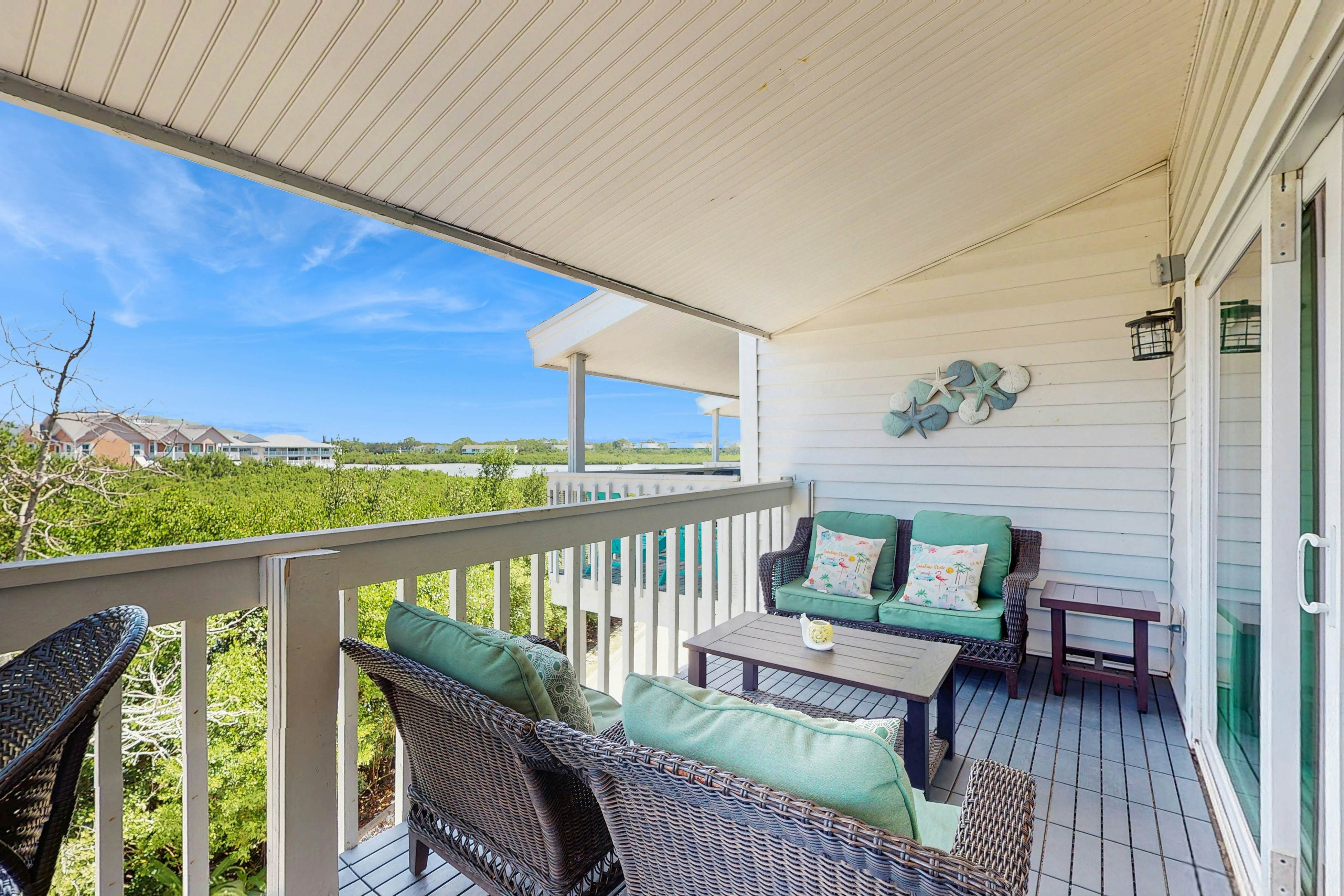 Tropical gem with pool - steps to beach - water-view balcony, private W/D & AC