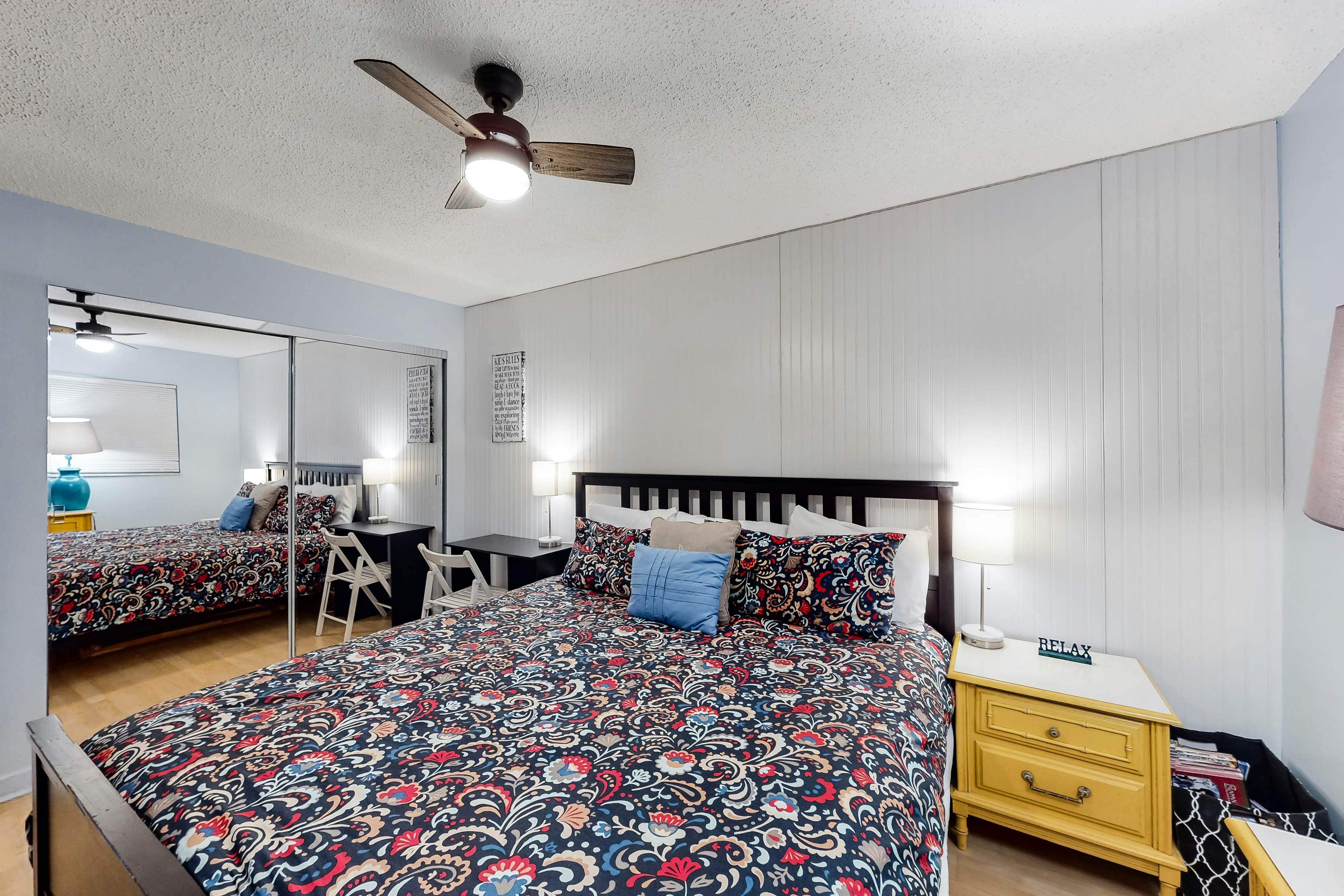 Updated beachside corner condo with pool and private wraparound balcony