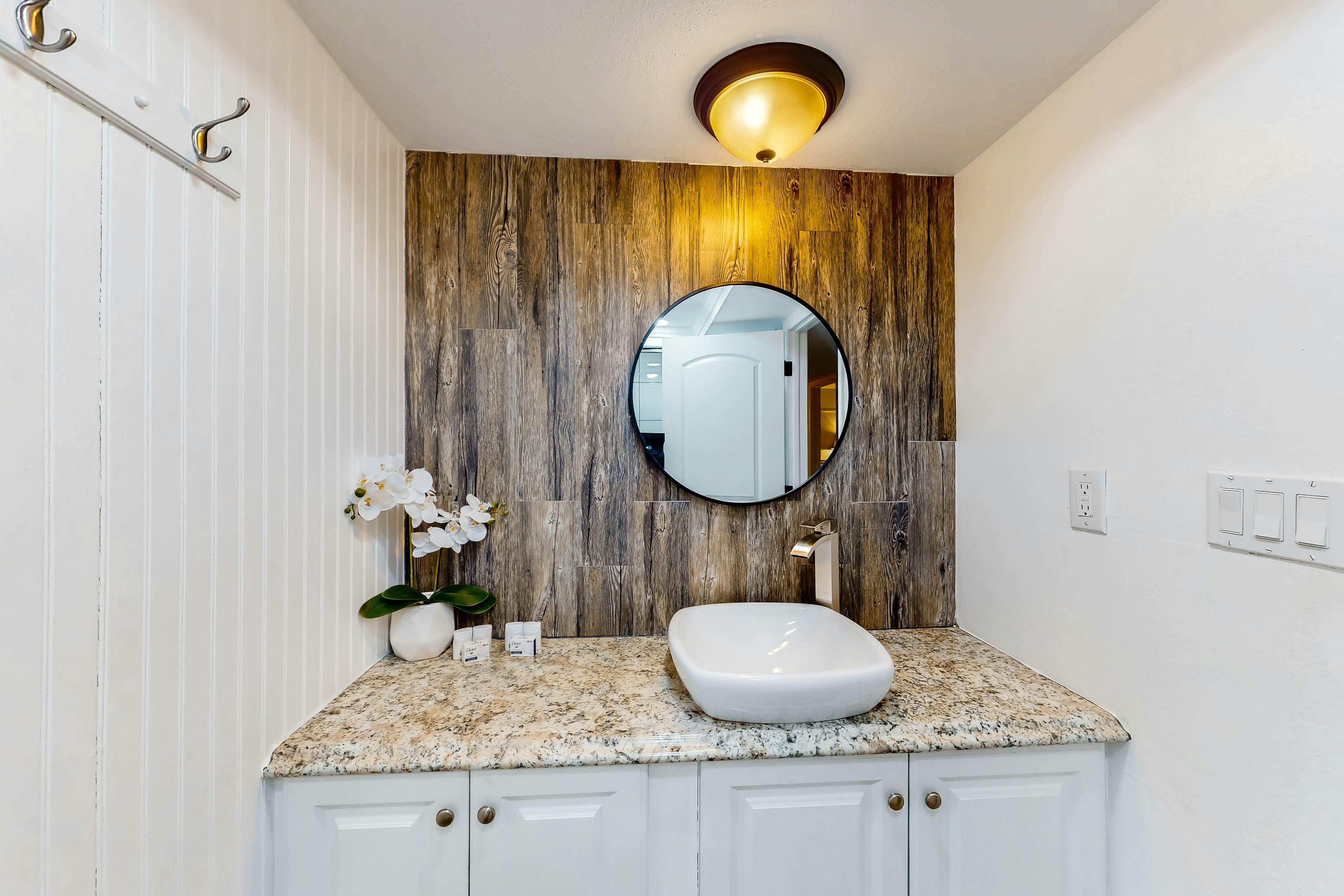 Updated beachside corner condo with pool and private wraparound balcony