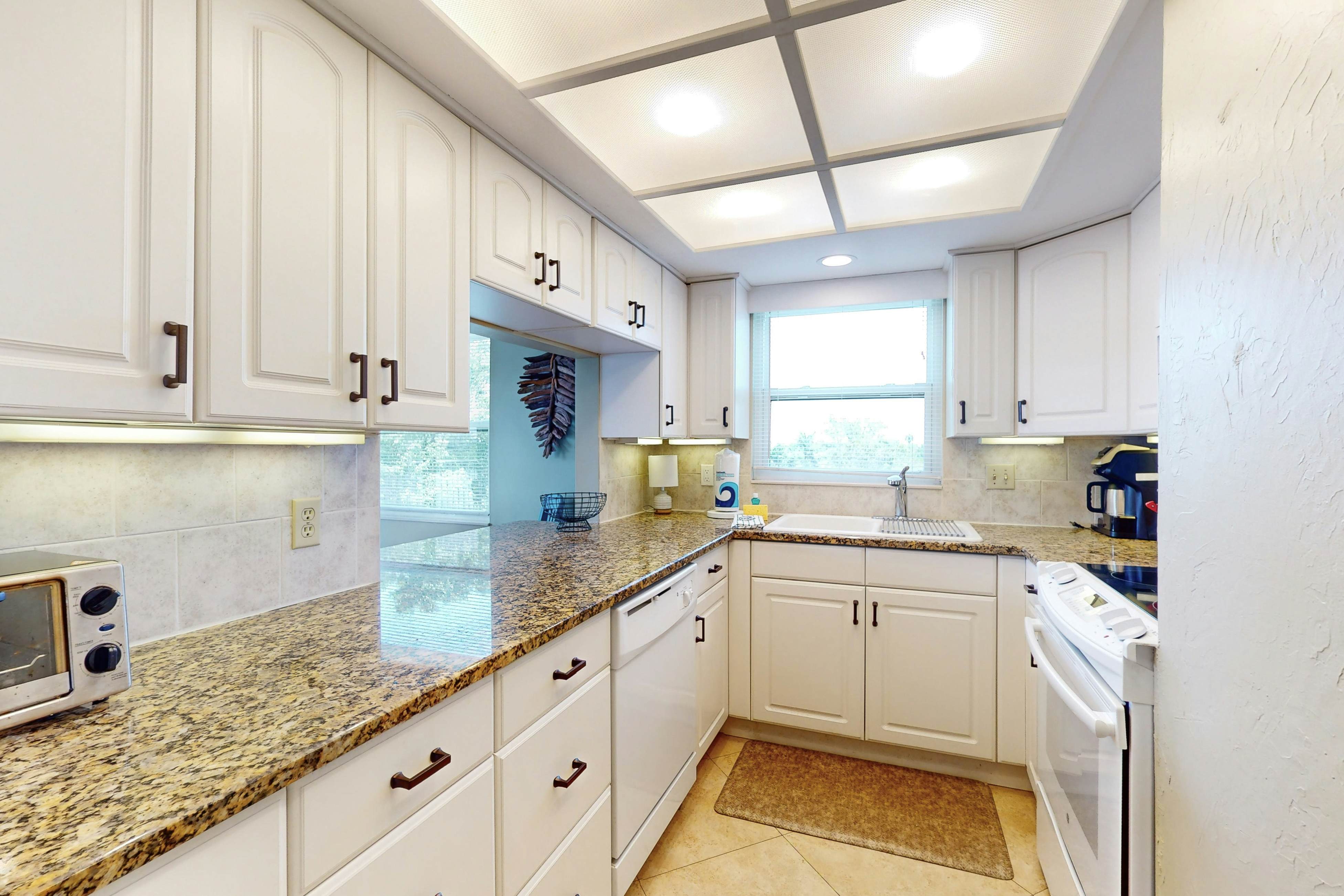 Intracoastal perch across from the beach with heated pool, dock & pickleball