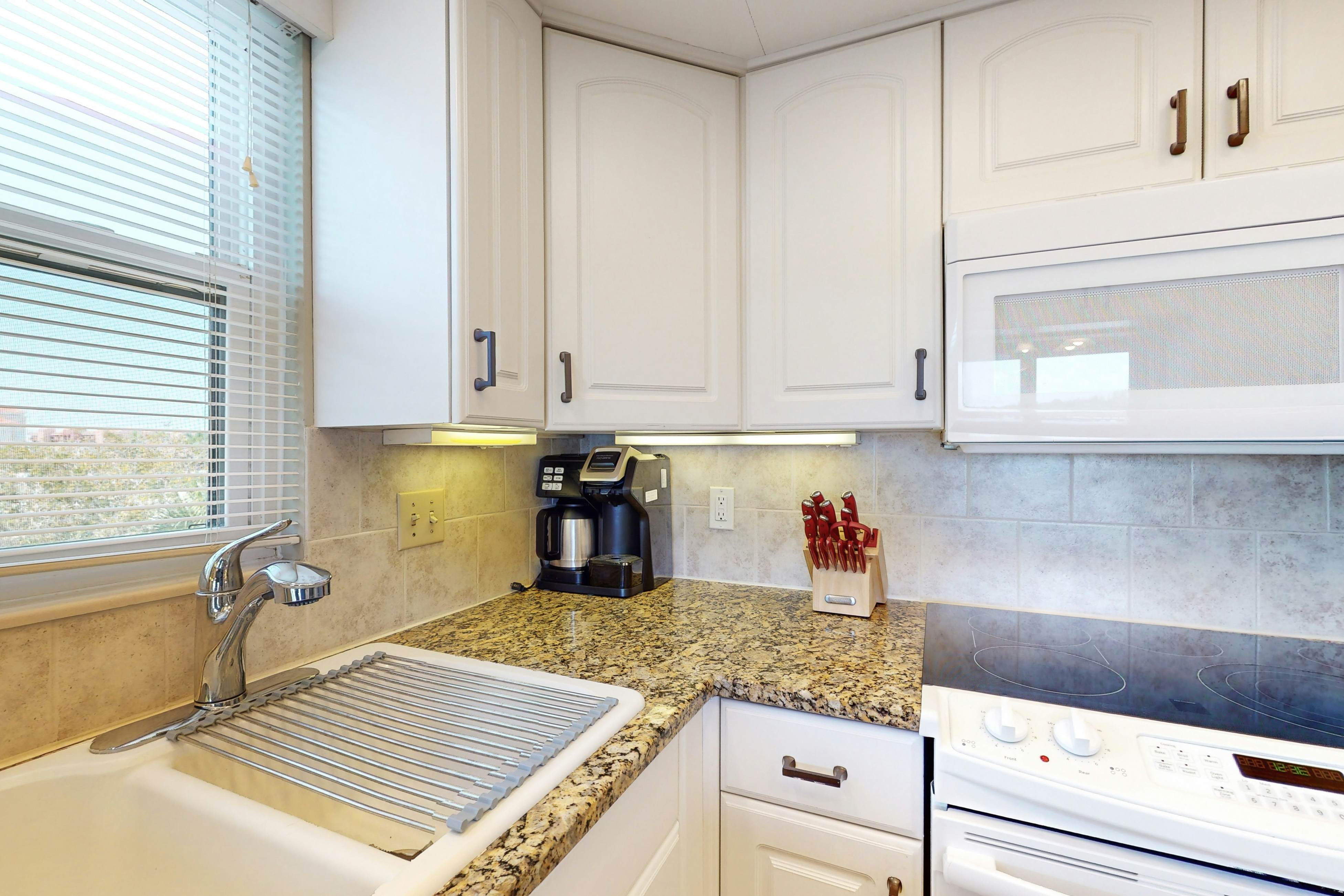 Intracoastal perch across from the beach with heated pool, dock & pickleball