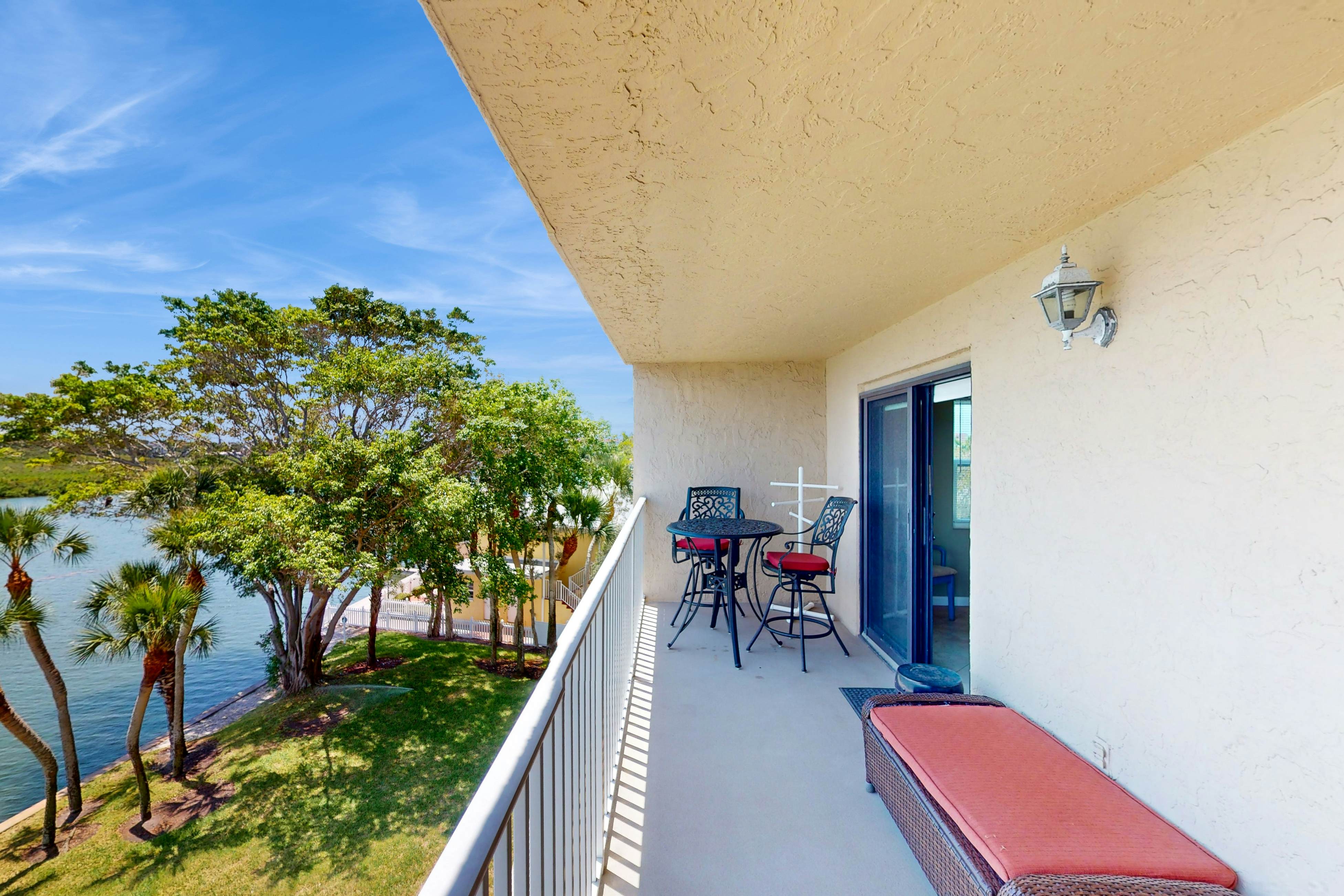 Intracoastal perch across from the beach with heated pool, dock & pickleball