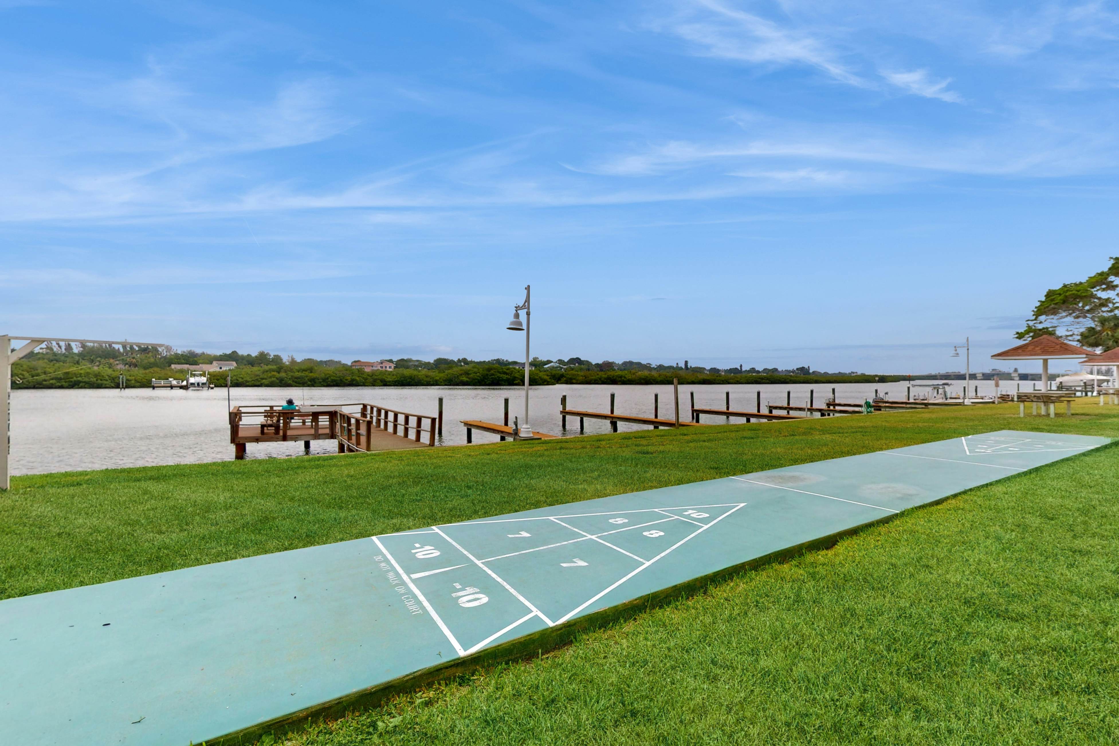 Intracoastal perch across from the beach with heated pool, dock & pickleball