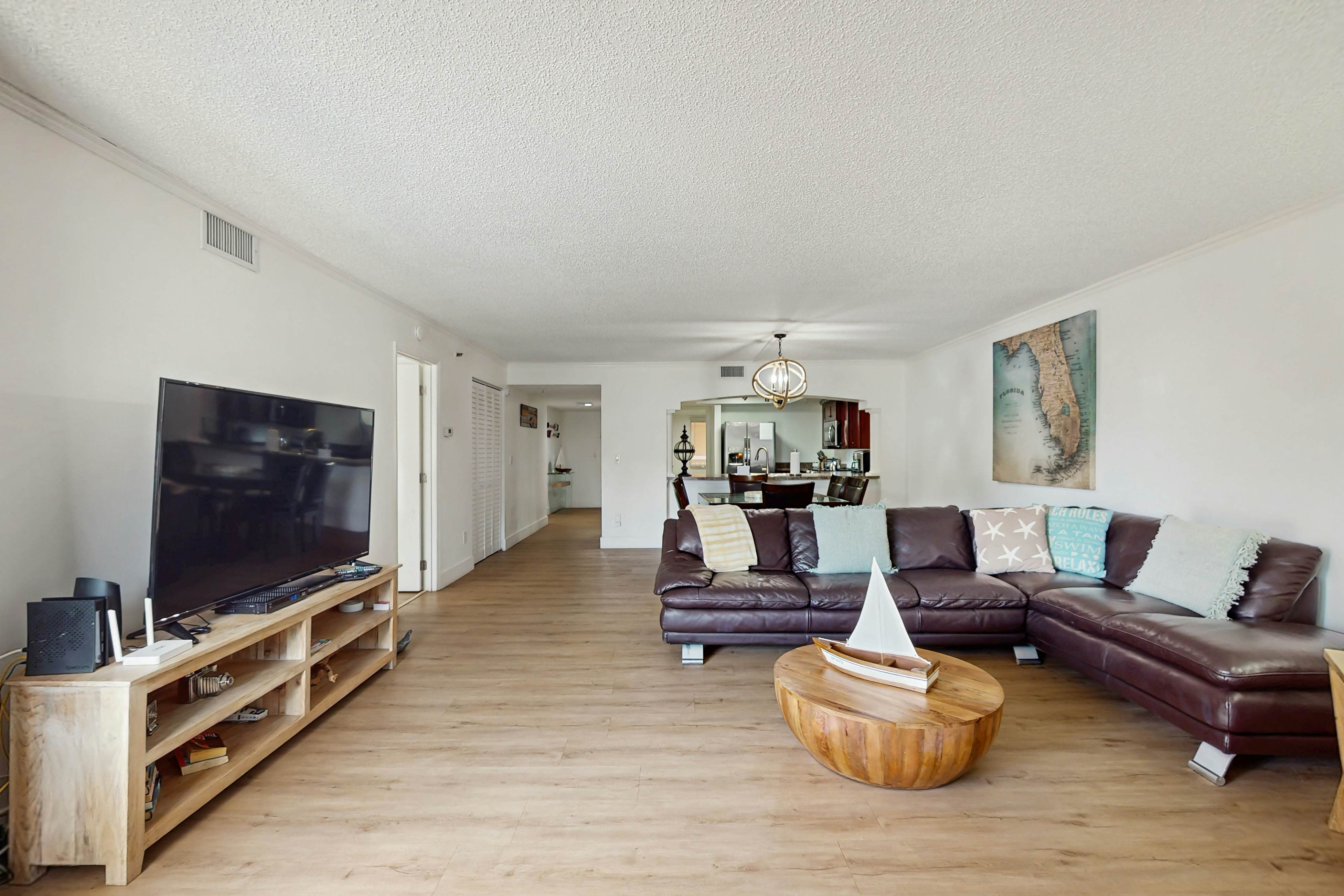 Modern cottage with peek-a-boo side Gulf view & beachfront heated pool & spa