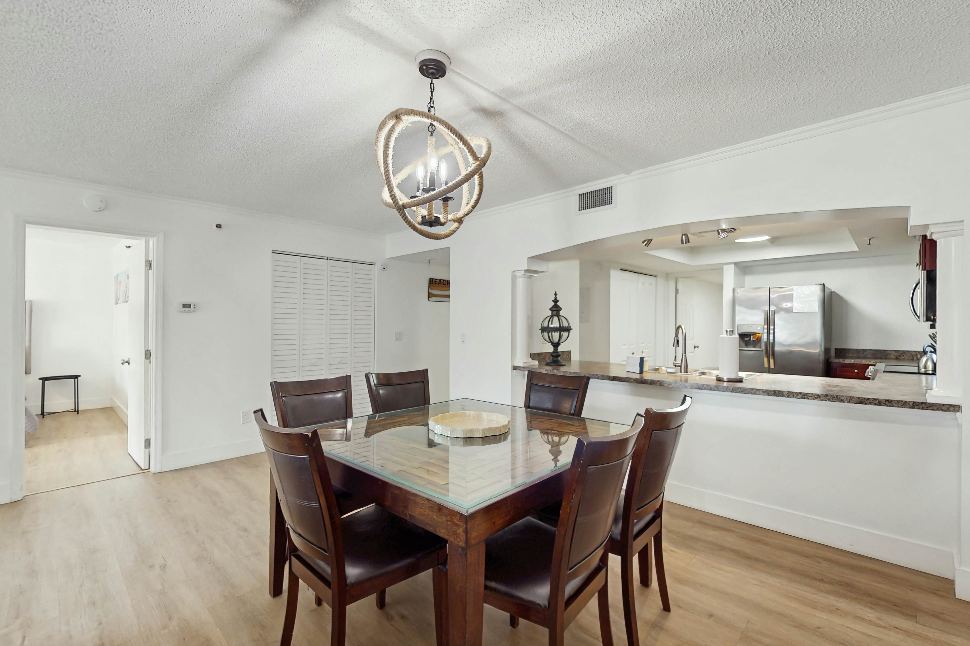 Modern cottage with peek-a-boo side Gulf view & beachfront heated pool & spa