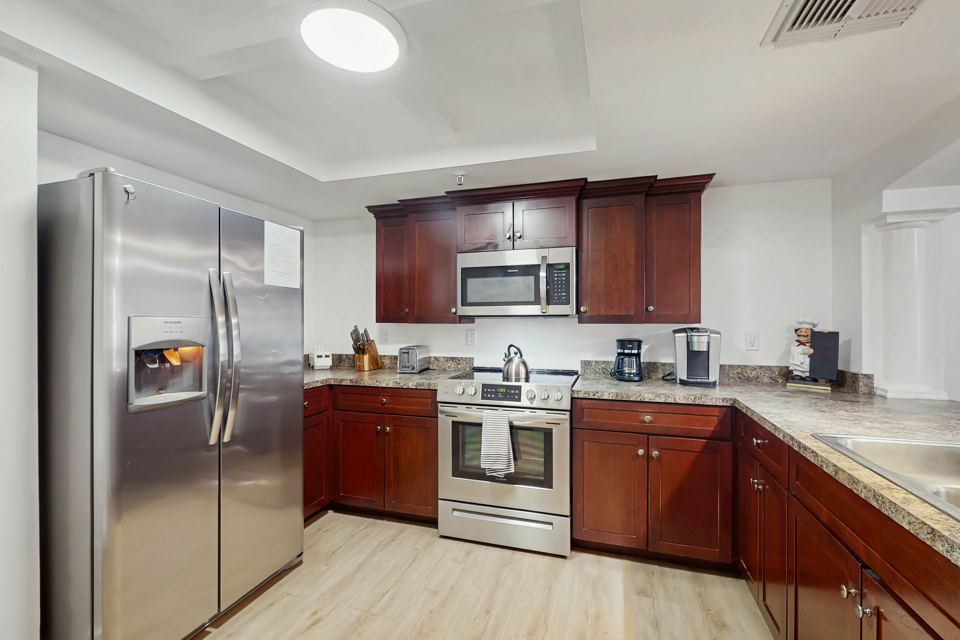 Modern cottage with peek-a-boo side Gulf view & beachfront heated pool & spa