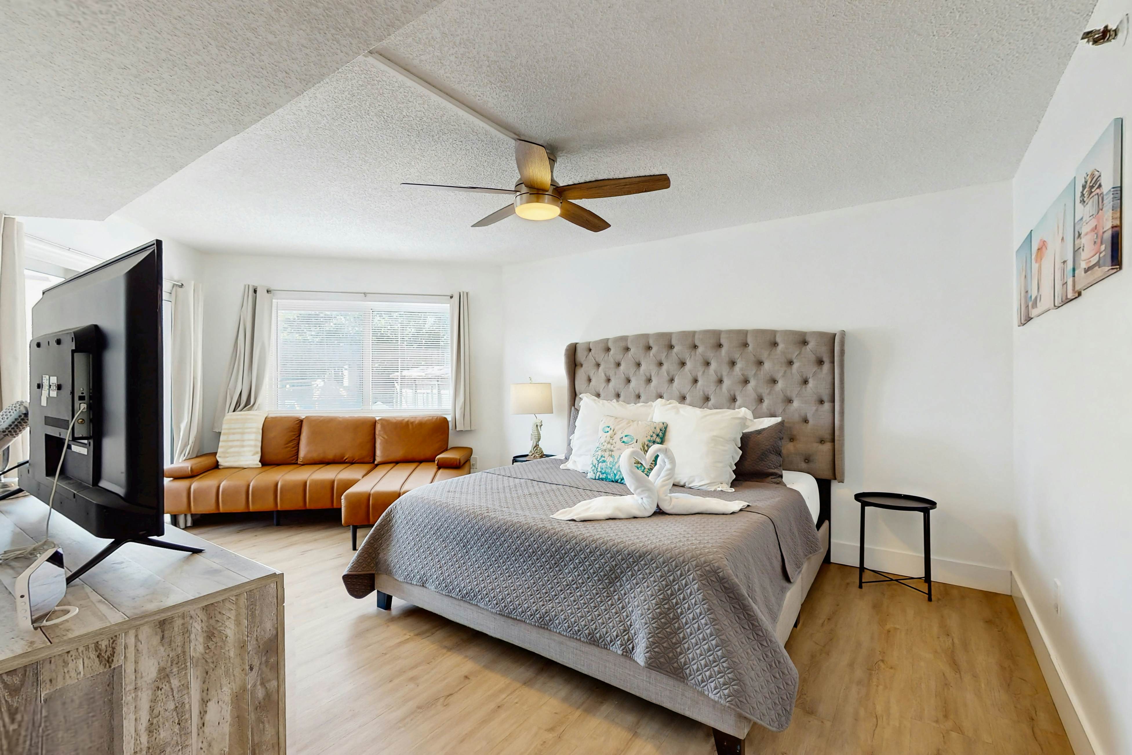 Modern cottage with peek-a-boo side Gulf view & beachfront heated pool & spa