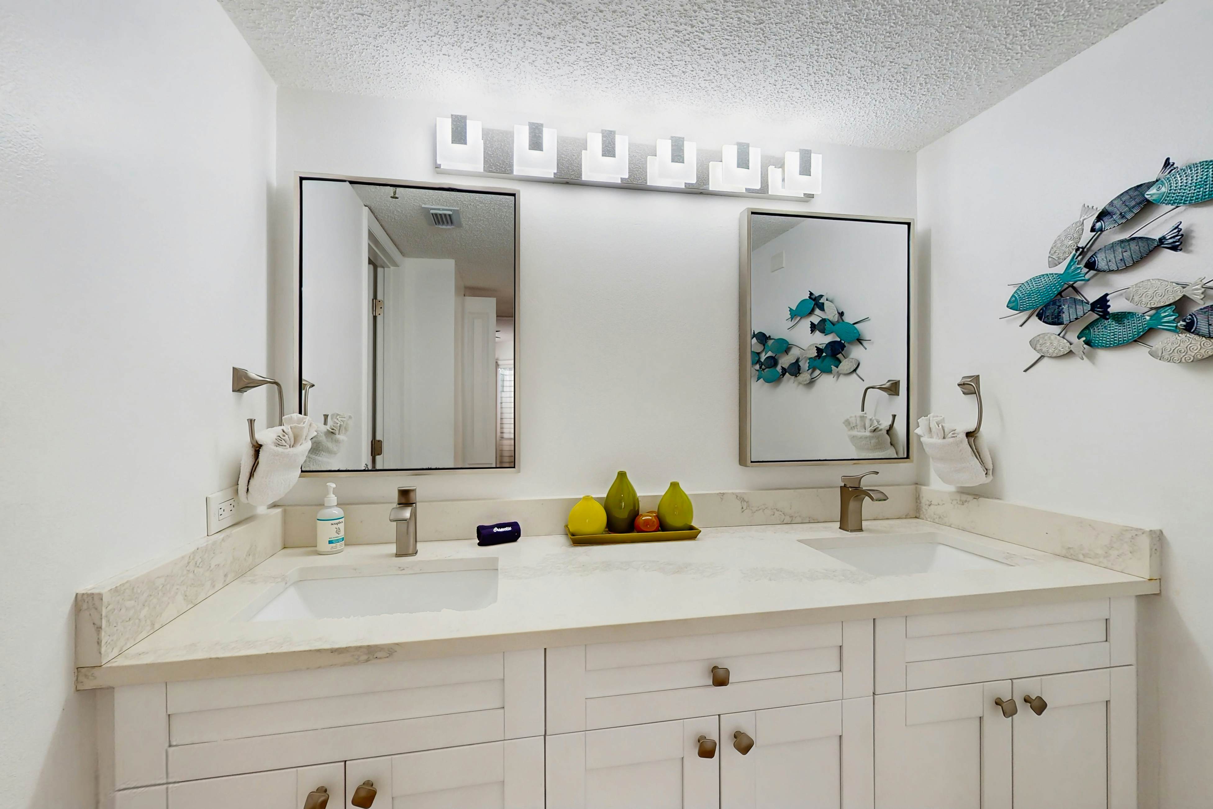 Modern cottage with peek-a-boo side Gulf view & beachfront heated pool & spa