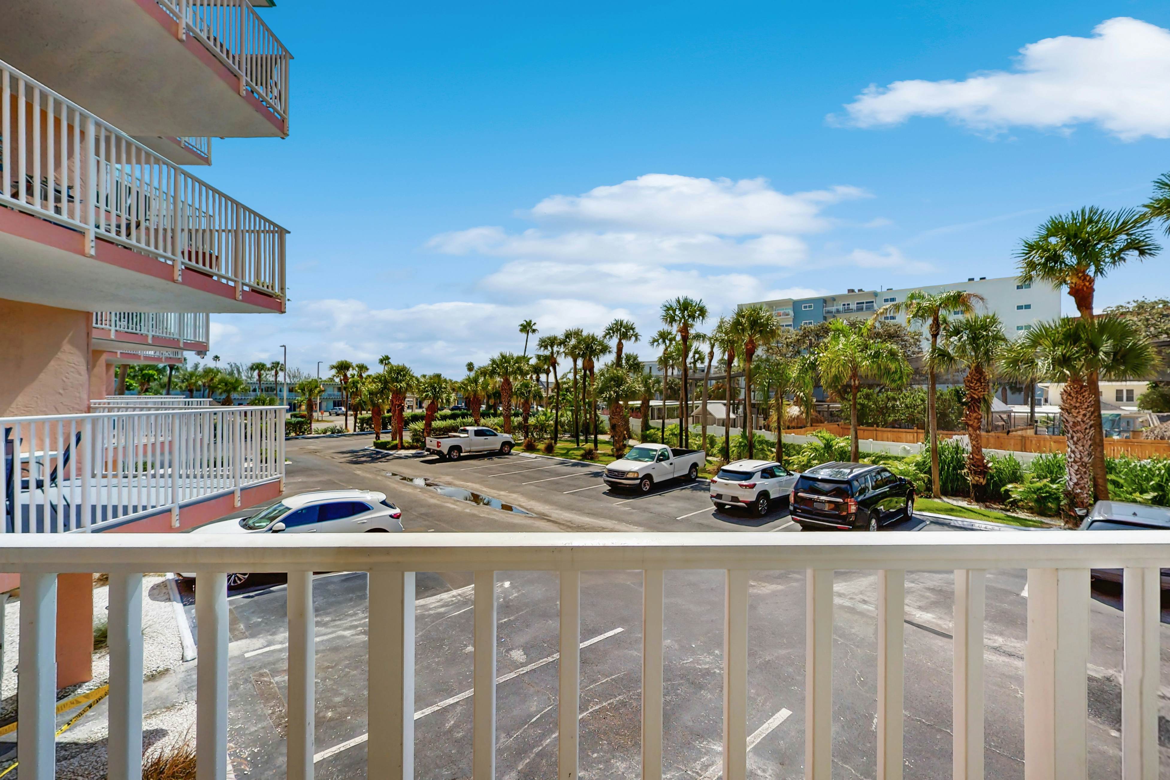 Modern cottage with peek-a-boo side Gulf view & beachfront heated pool & spa