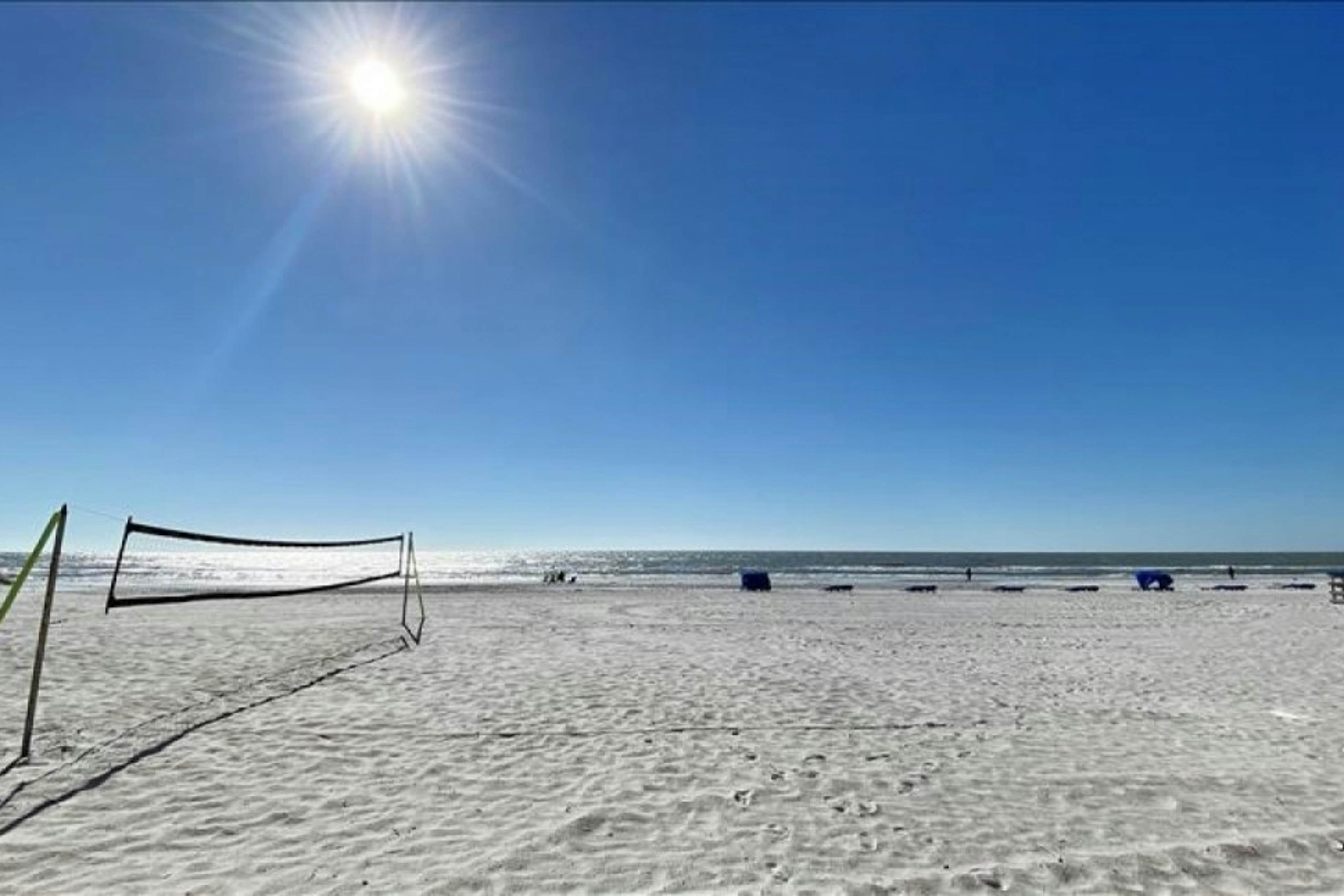 Modern cottage with peek-a-boo side Gulf view & beachfront heated pool & spa