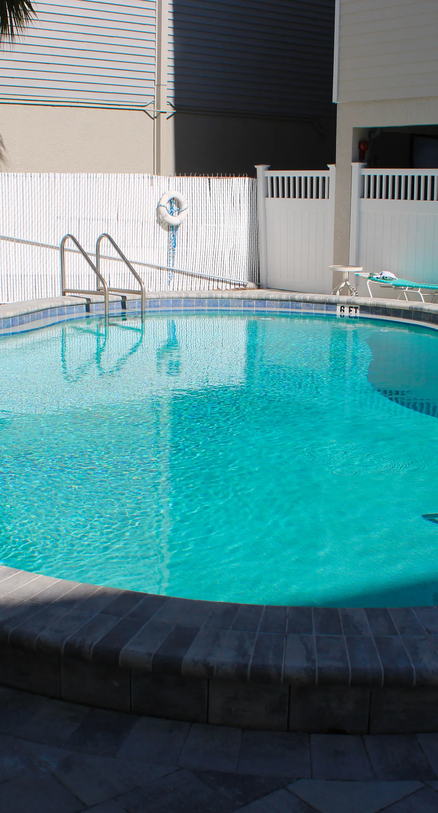 Spacious and family friendly with pool dock and just steps to the beaches