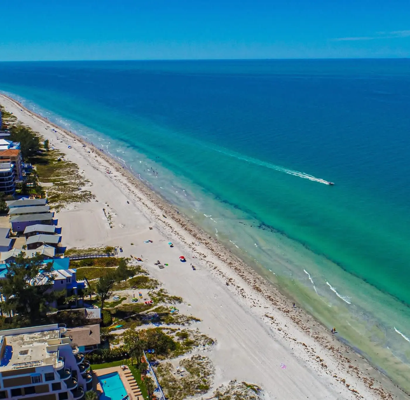 Spacious and family friendly with pool dock and just steps to the beaches