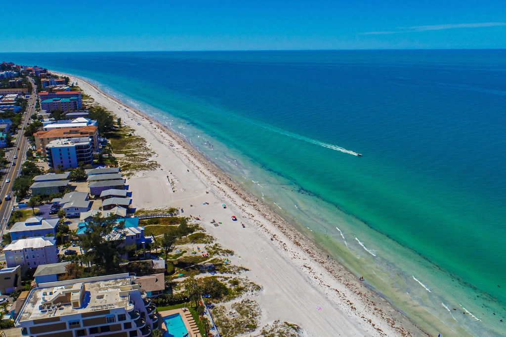 Spacious and family friendly with pool dock and just steps to the beaches