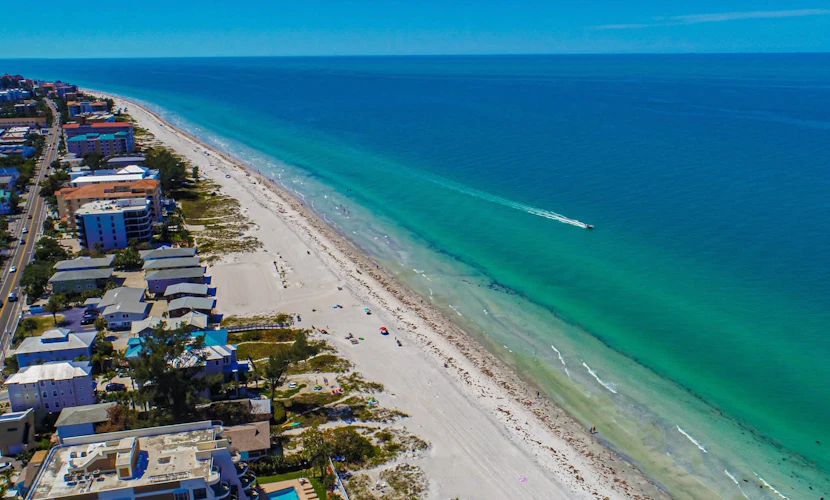 Spacious and family friendly with pool dock and just steps to the beaches