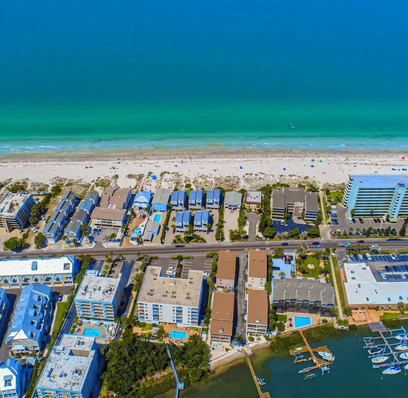 Spacious and family friendly with pool dock and just steps to the beaches
