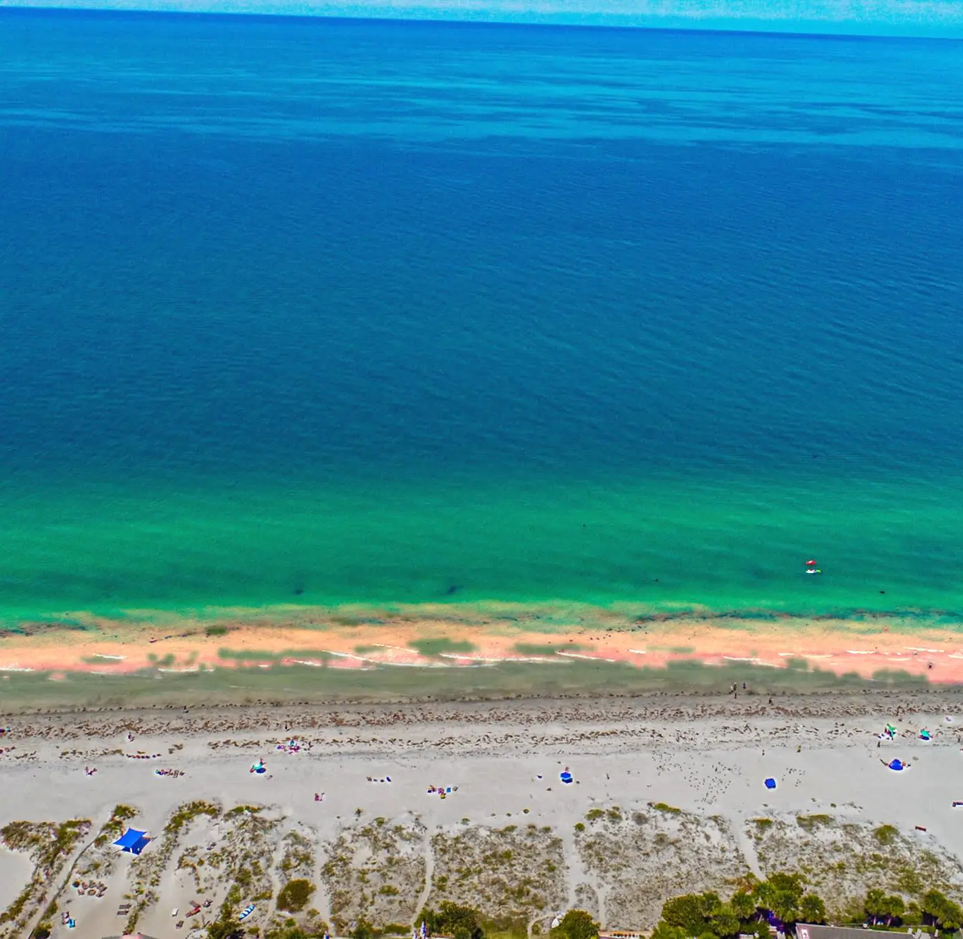 Spacious and family friendly with pool dock and just steps to the beaches