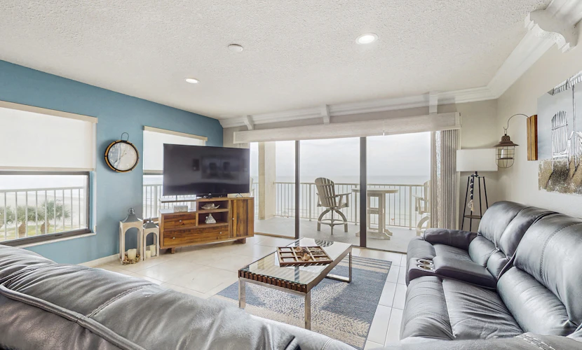 Coastal condo with sweeping Gulf views and wraparound balcony dogs welcome