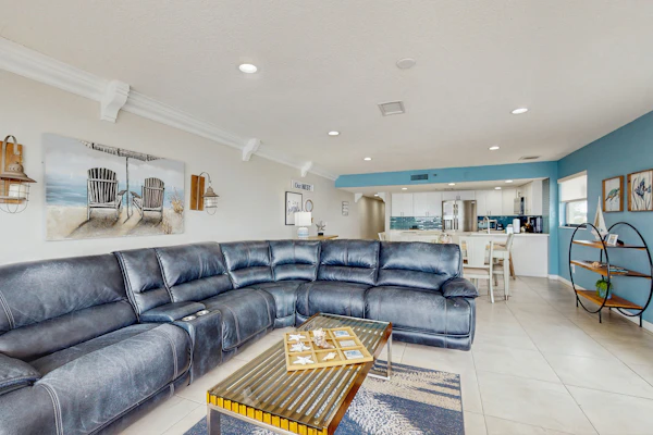 Coastal condo with sweeping Gulf views and wraparound balcony dogs welcome