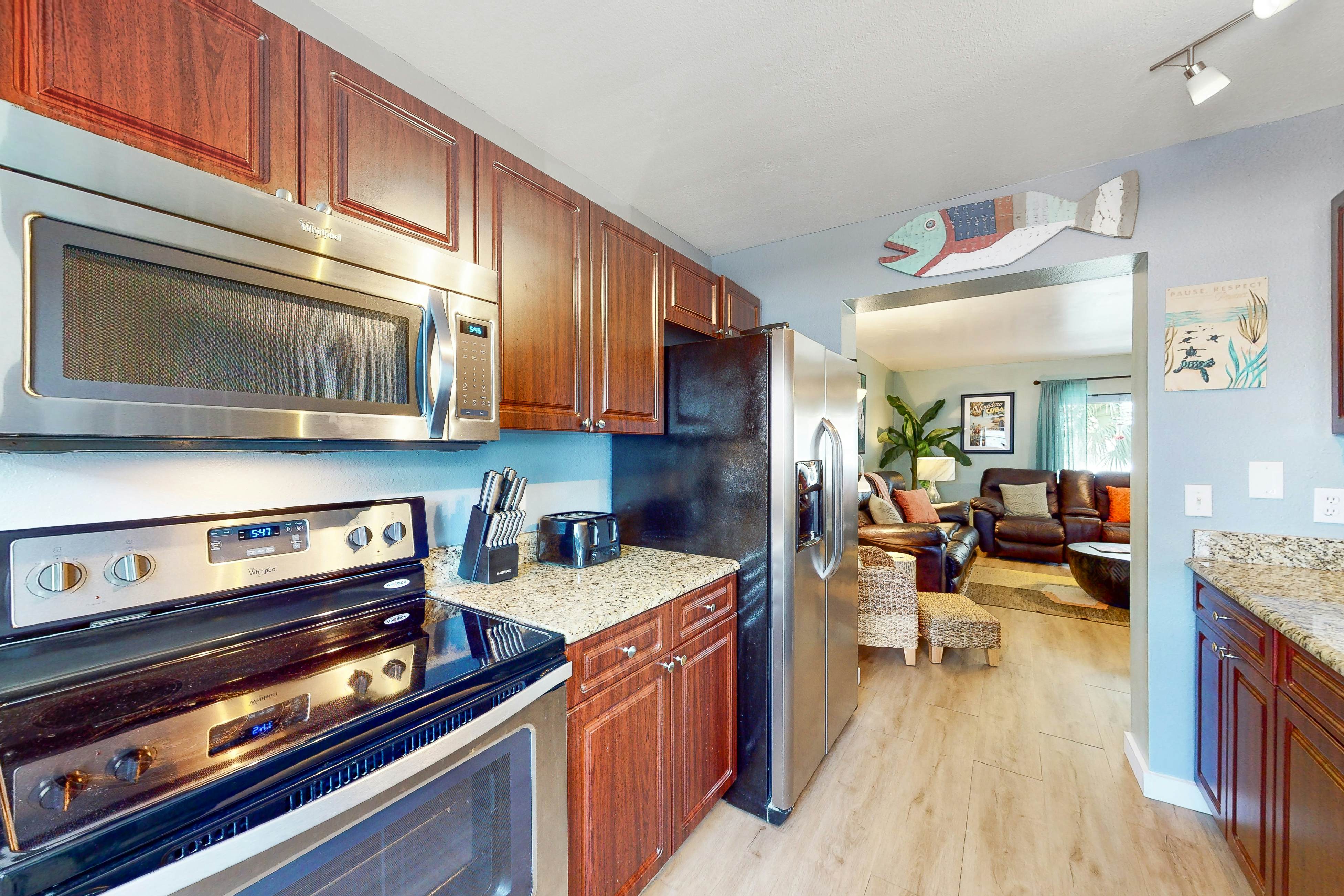 Lovely waterfront townhouse with pool, fast WiFi, central AC, & washer/dryer