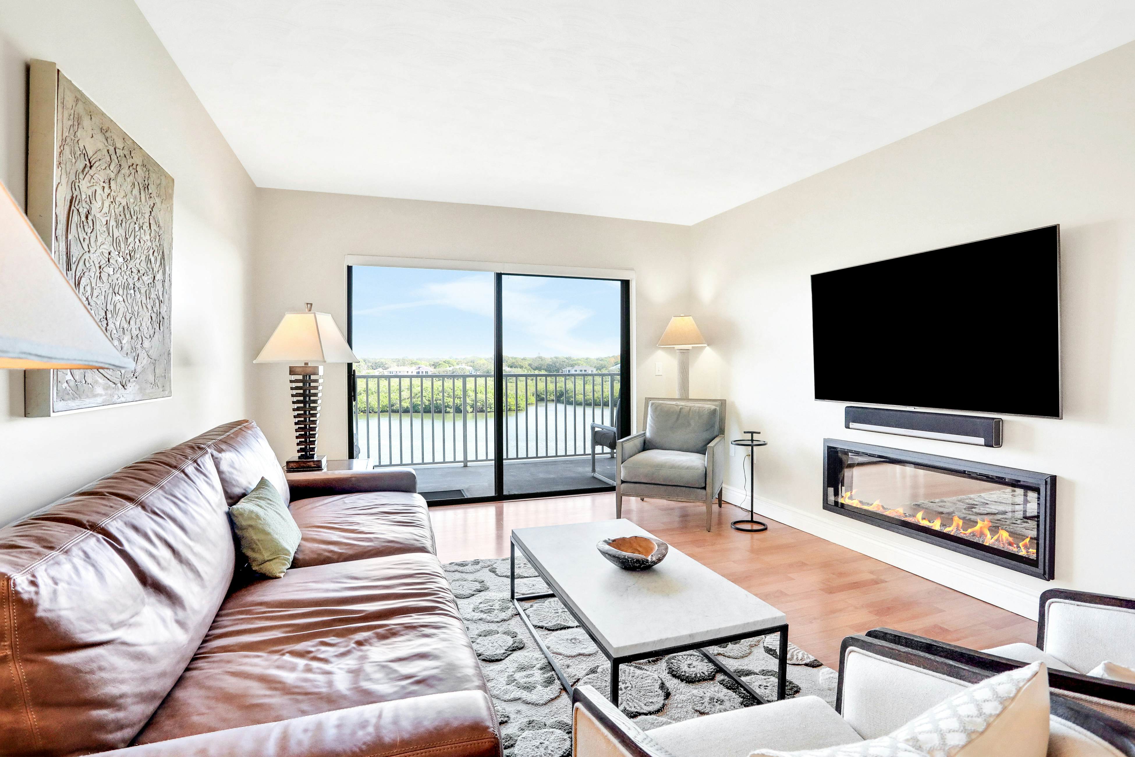 Elegant condo with water view near beach - pool & hot tub, fast WiFi & AC