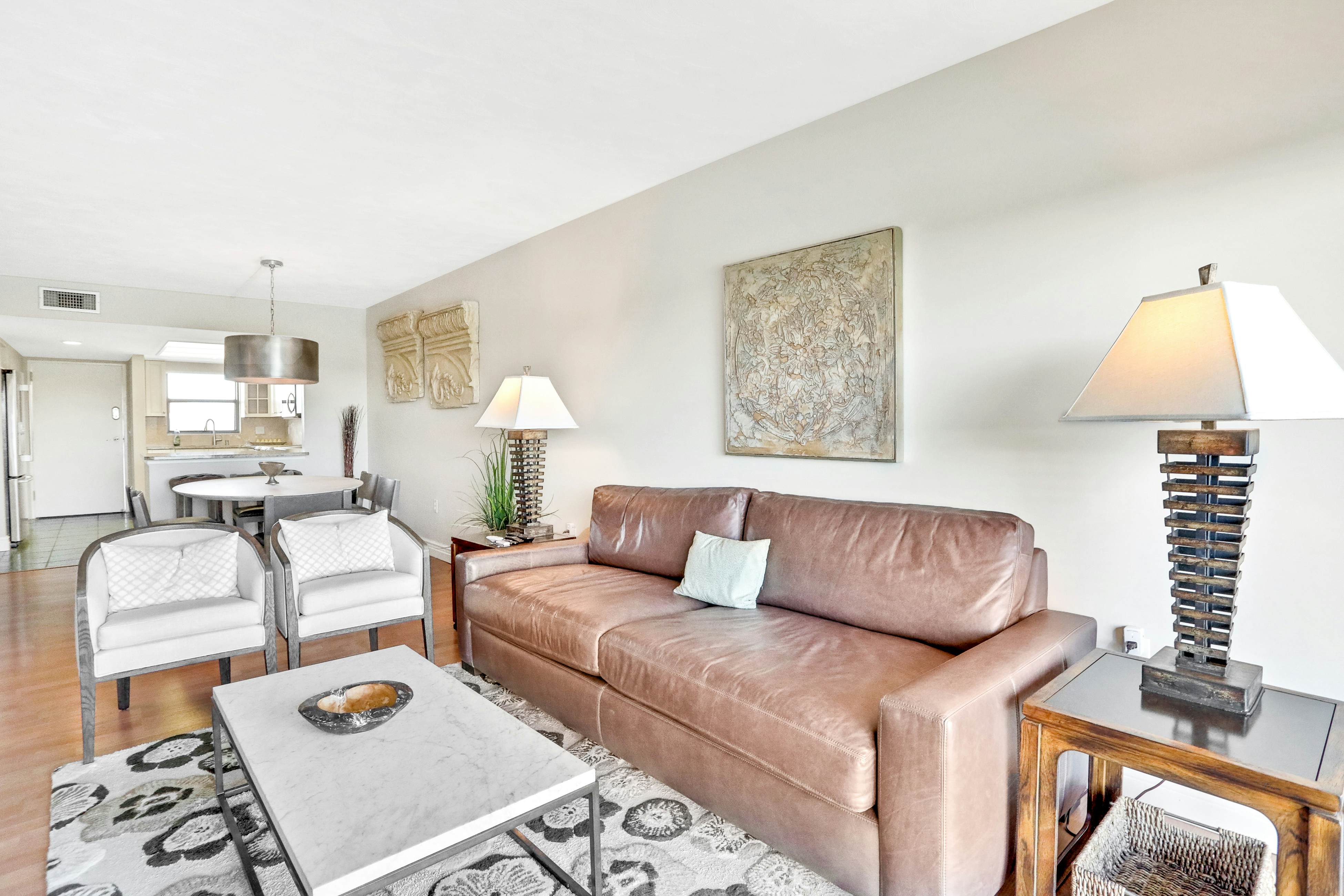 Elegant condo with water view near beach - pool & hot tub, fast WiFi & AC