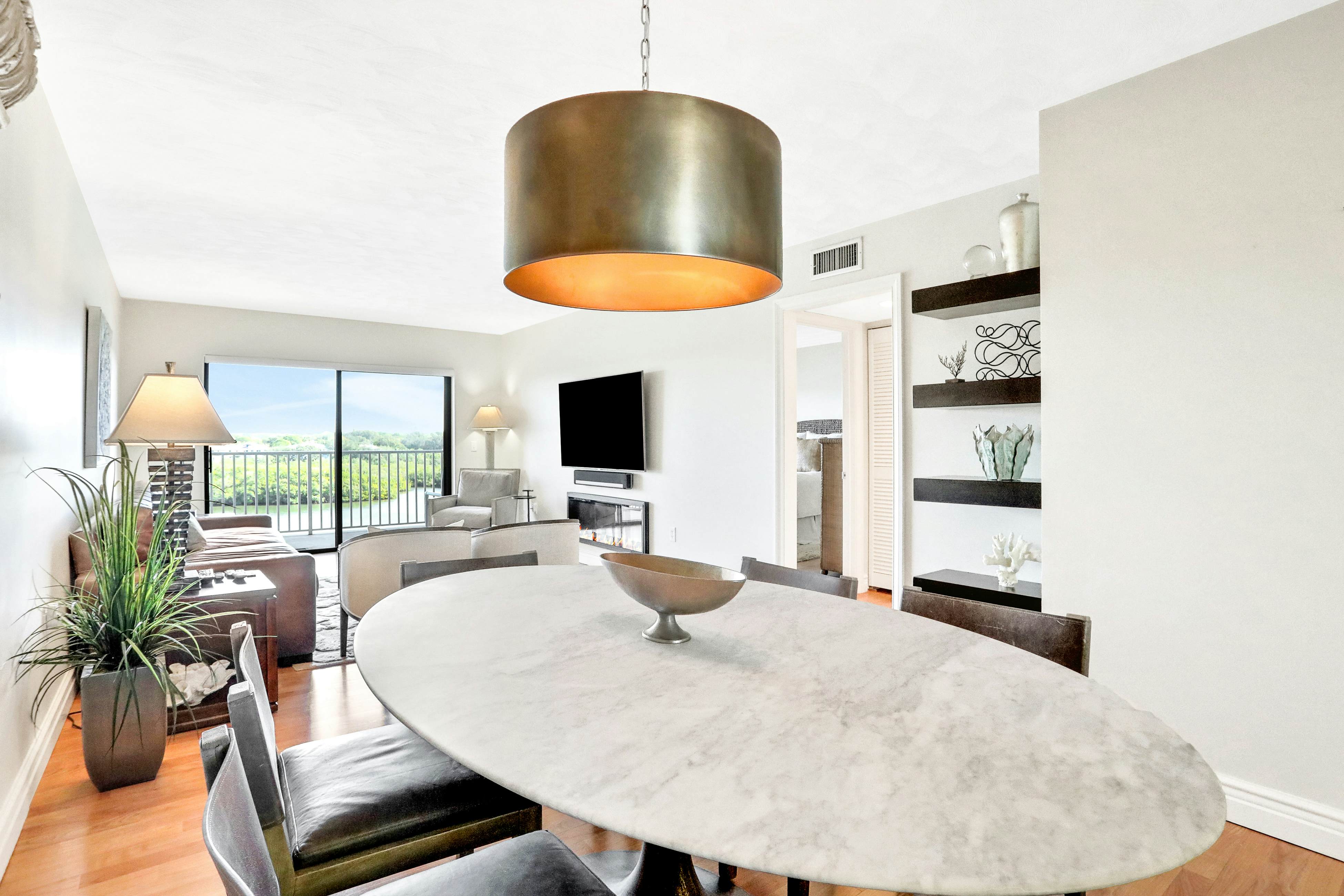 Elegant condo with water view near beach - pool & hot tub, fast WiFi & AC