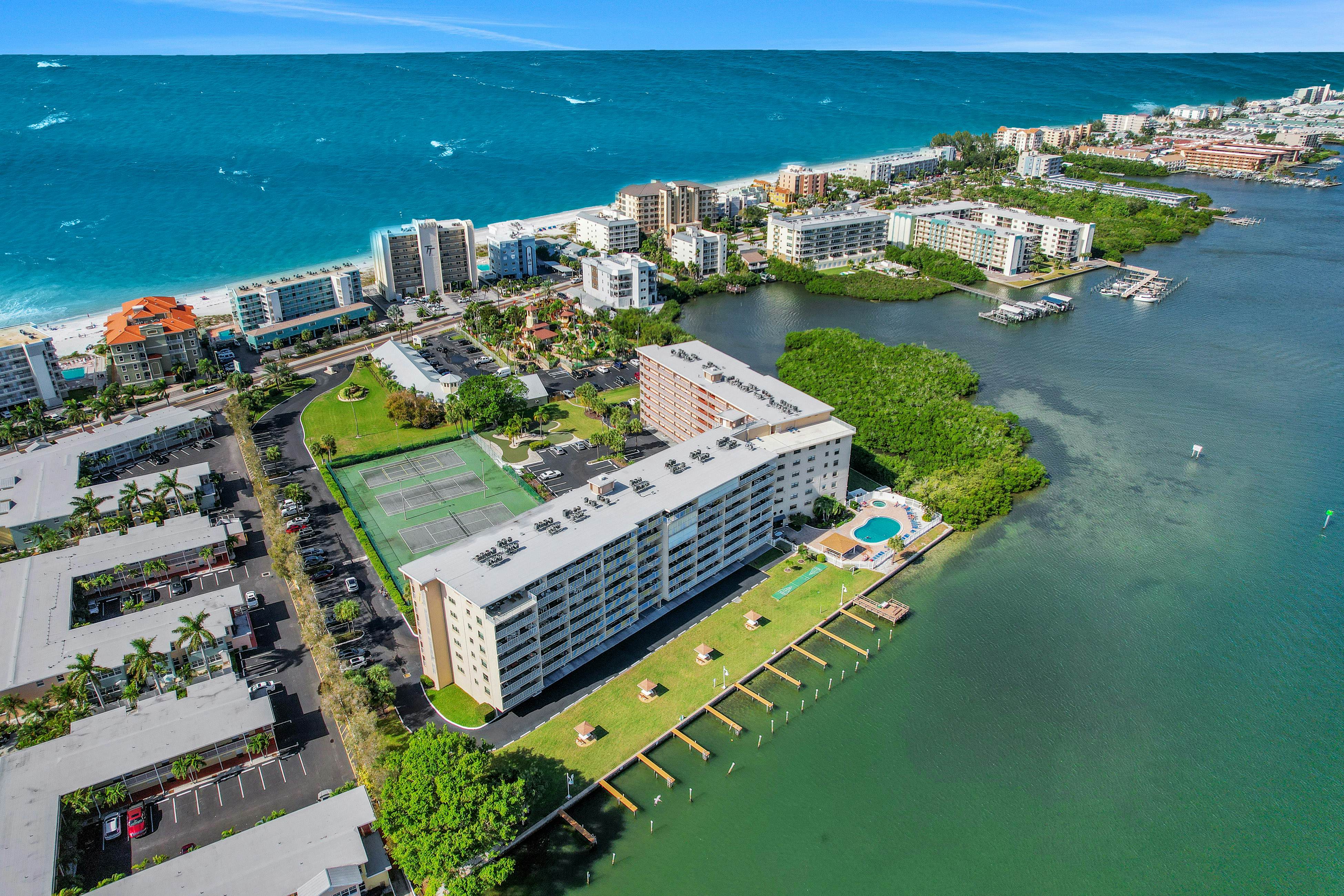 Elegant condo with water view near beach - pool & hot tub, fast WiFi & AC
