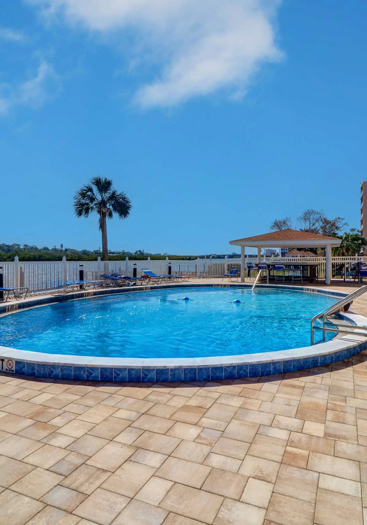 Elegant condo with water view near beach pool and hot tub fast WiFi and AC