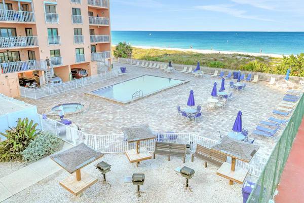 Beachfront condo with pool tennis court and AC Dog friendly