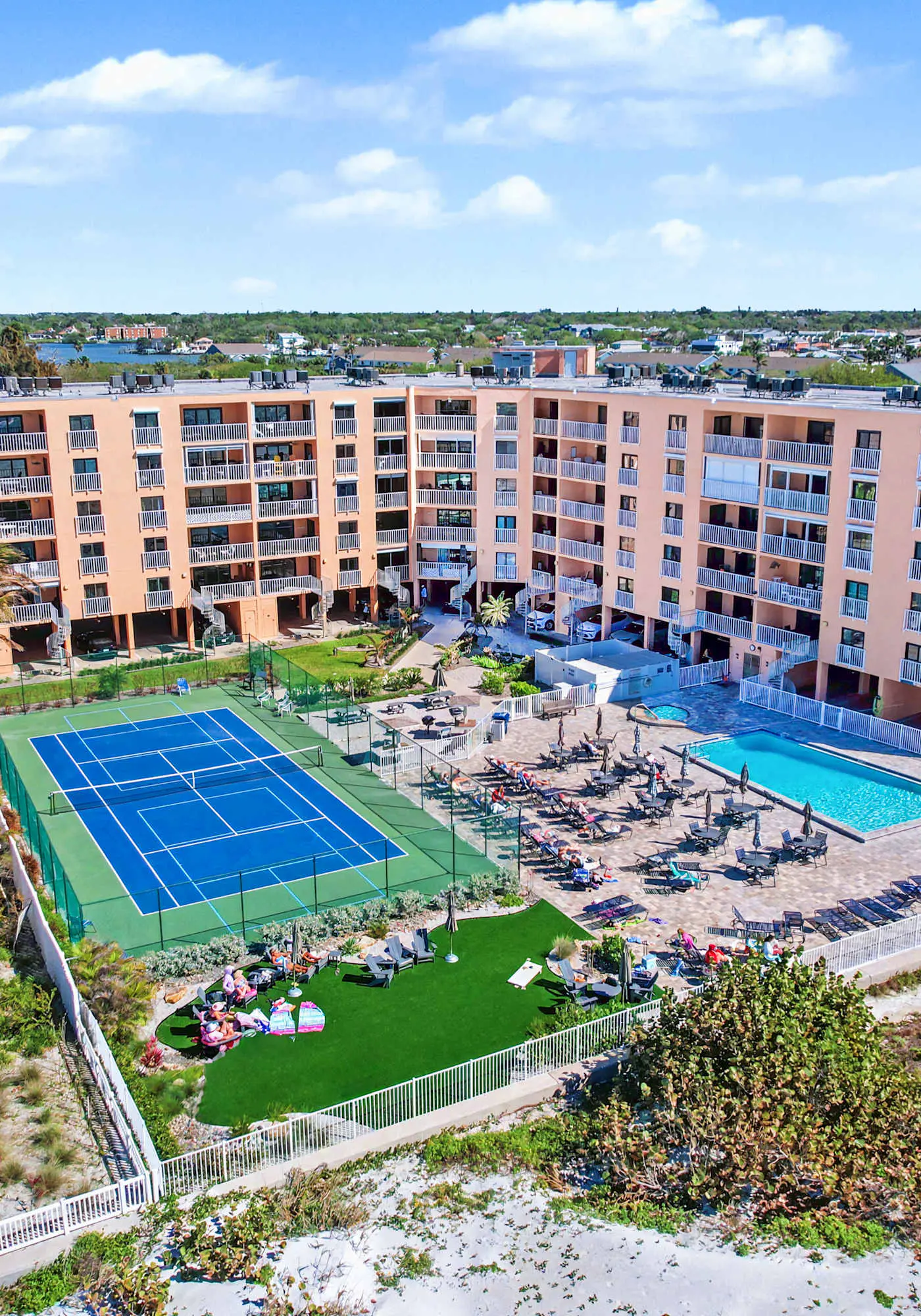 Beachfront condo with pool tennis court and AC Dog friendly