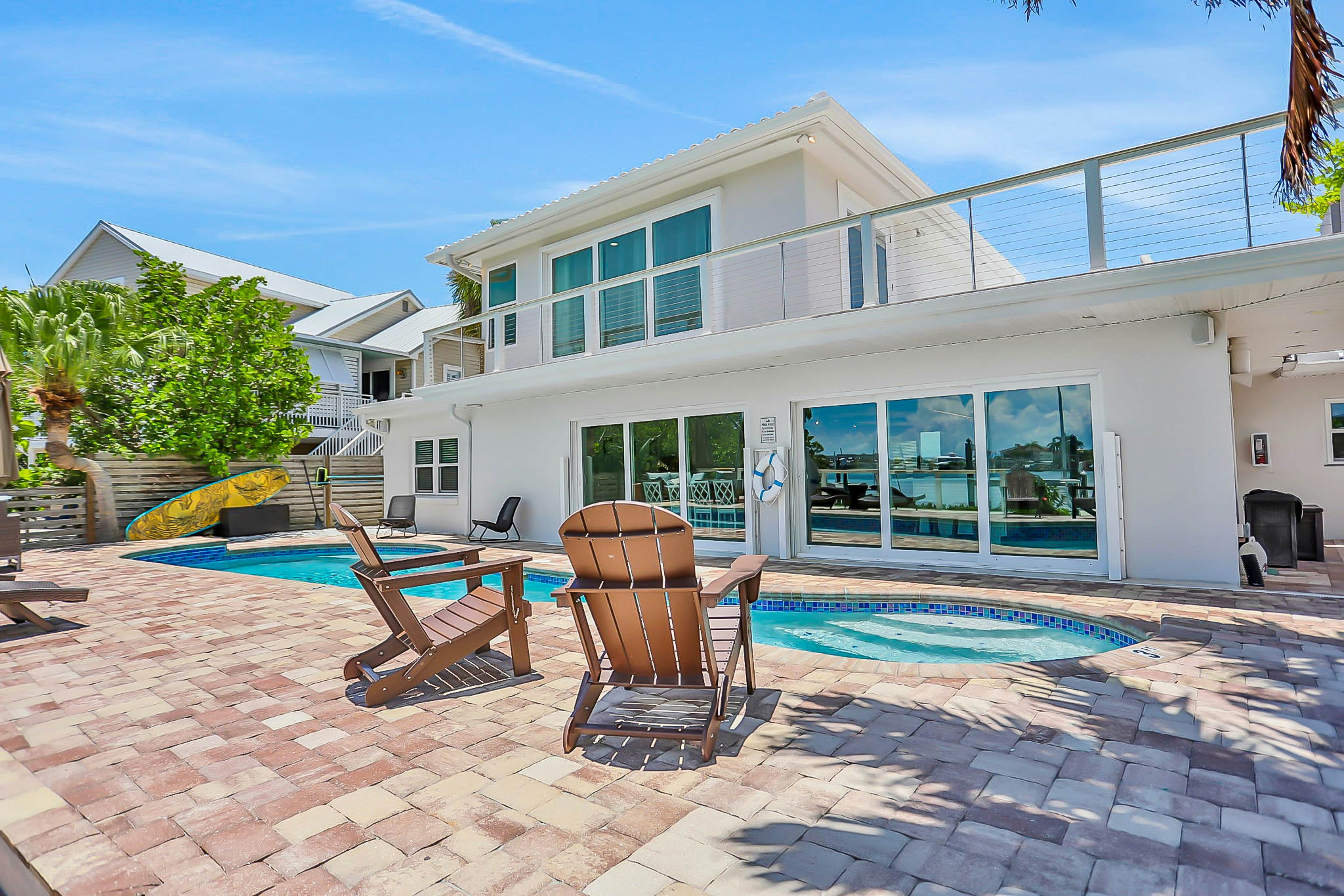Stylish waterfront home with private pool, dock 