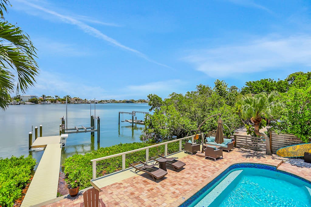 Stylish waterfront home with private pool dock