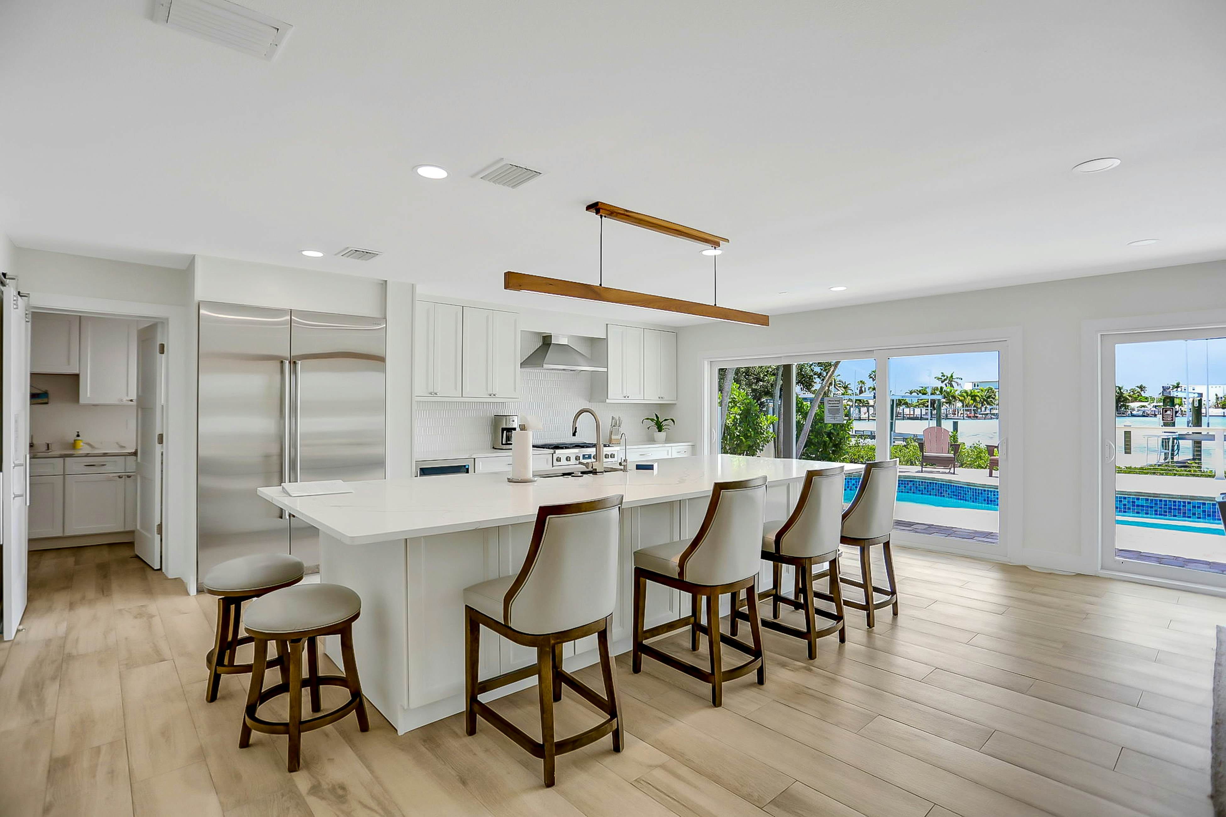 Stylish waterfront home with private pool, dock 