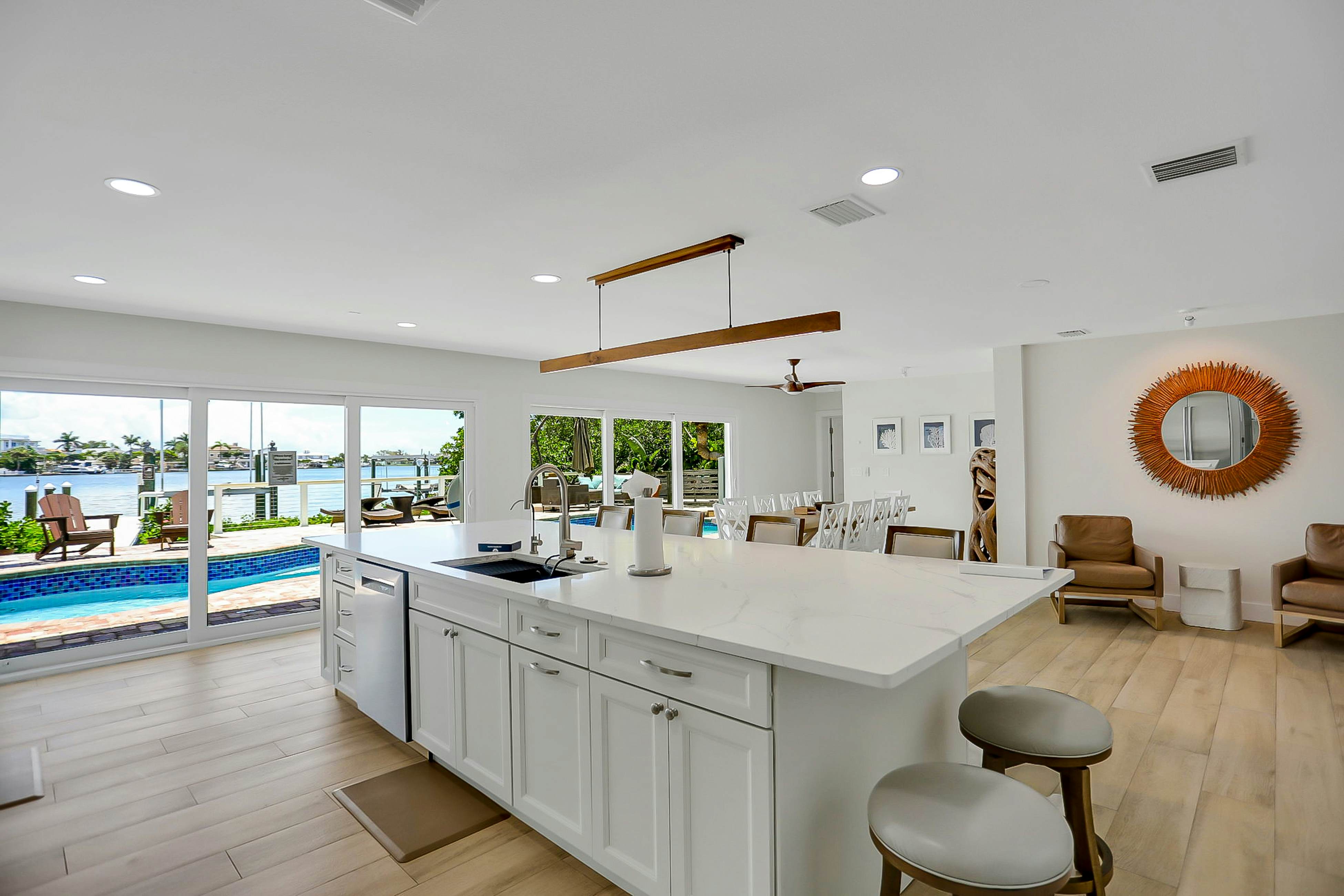 Stylish waterfront home with private pool, dock 