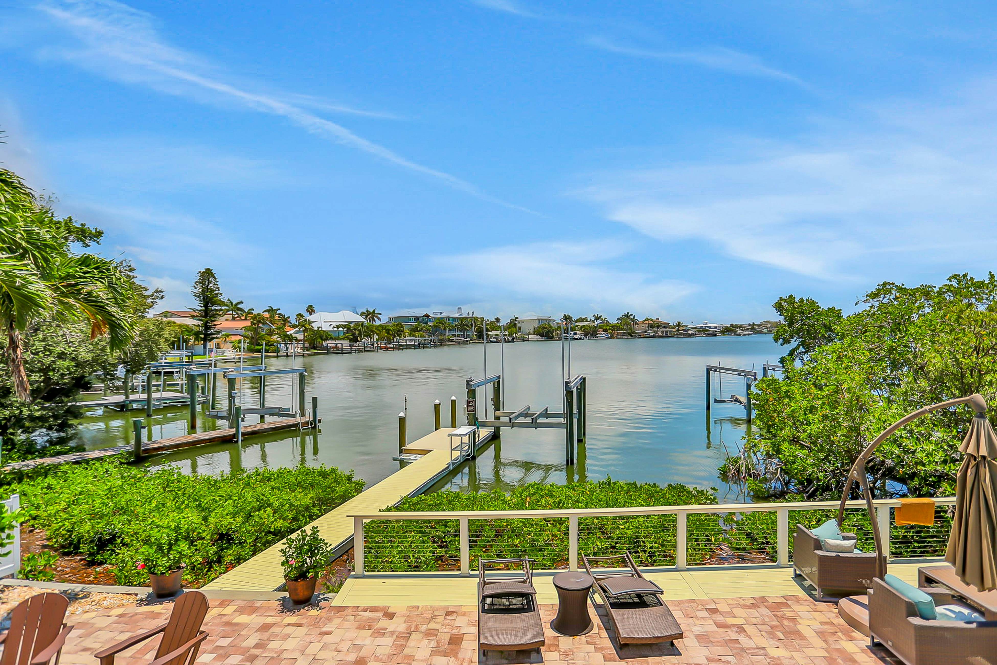 Stylish waterfront home with private pool, dock 