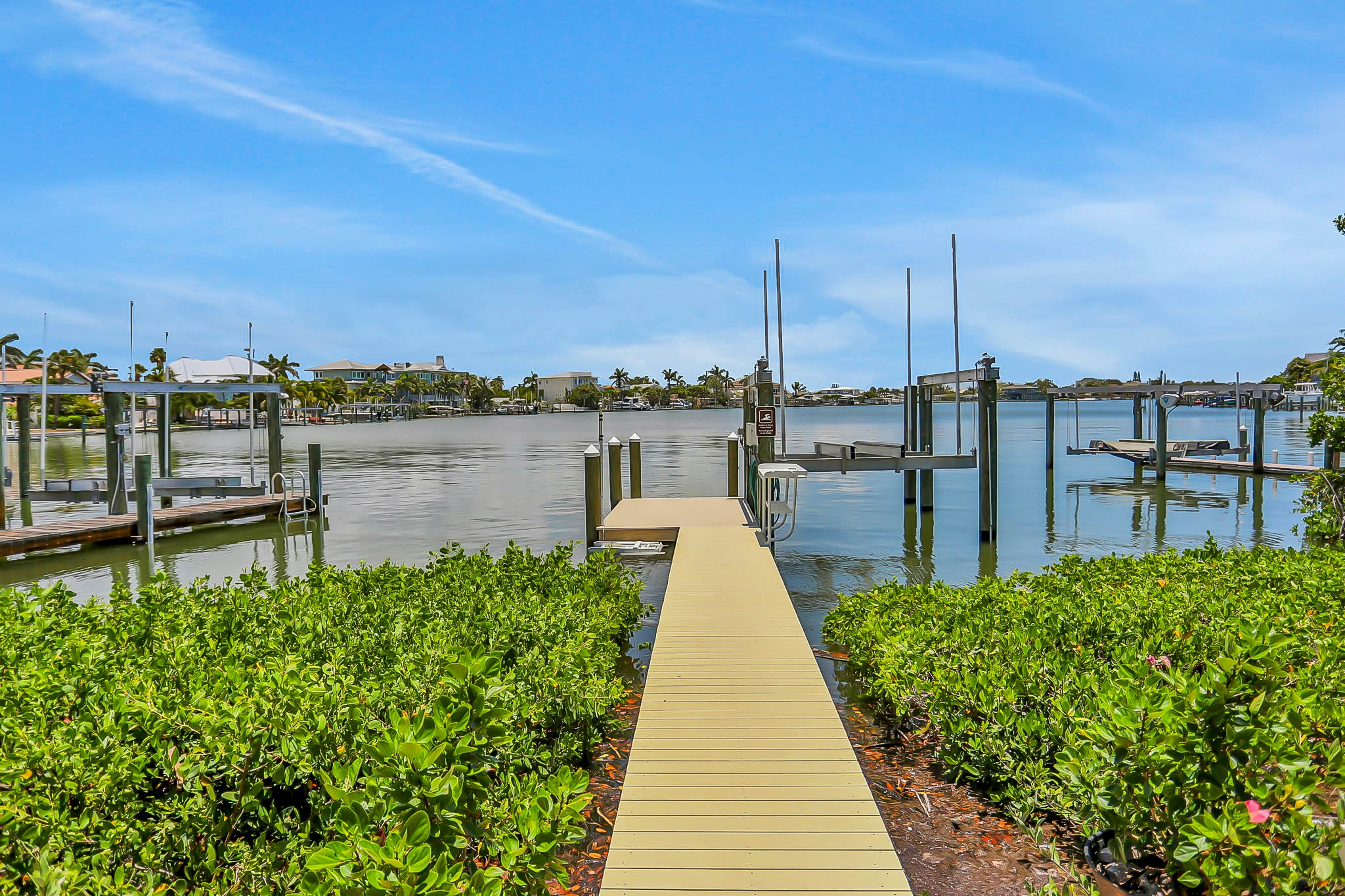 Stylish waterfront home with private pool, dock 