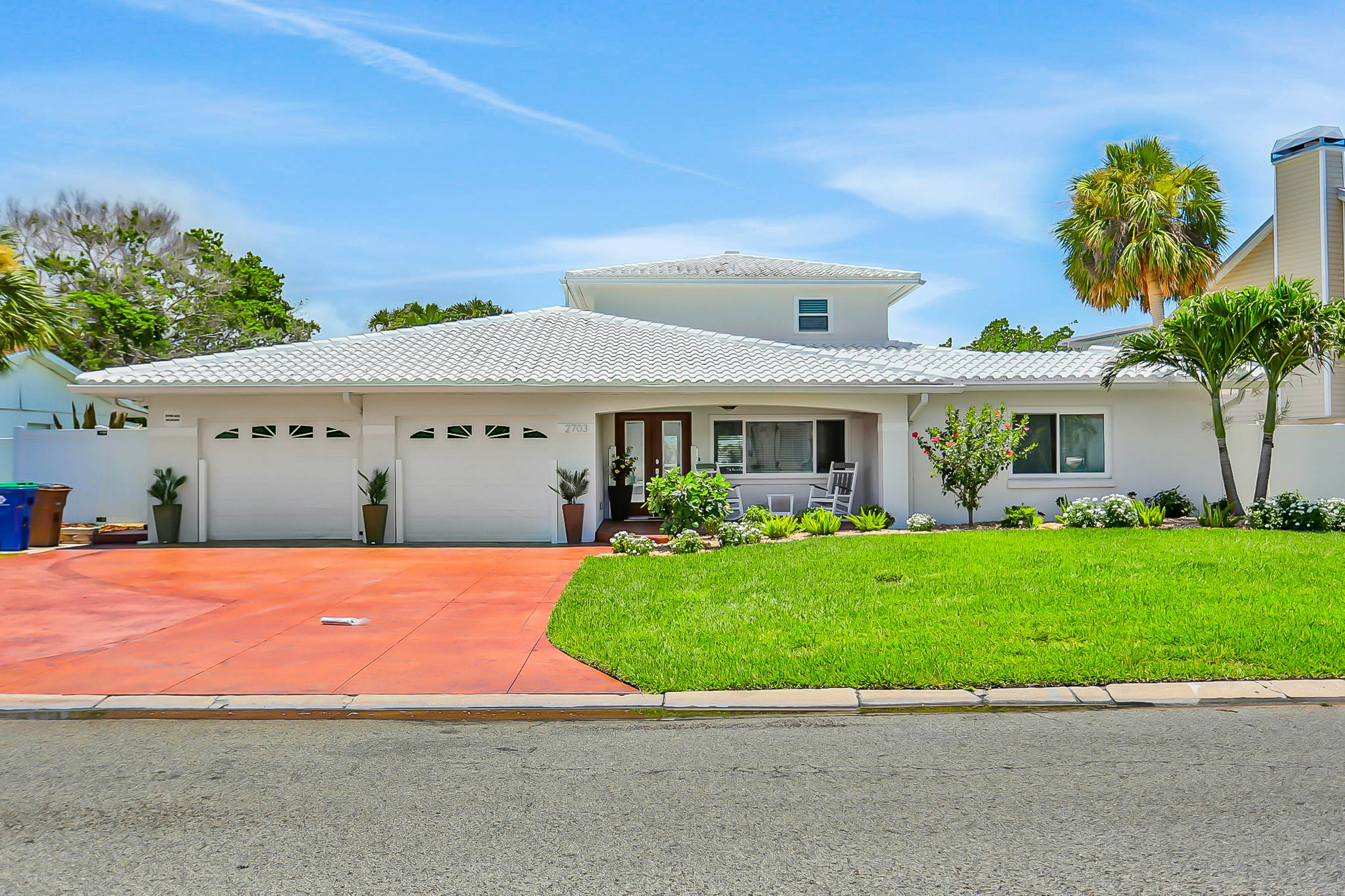 Stylish waterfront home with private pool, dock 